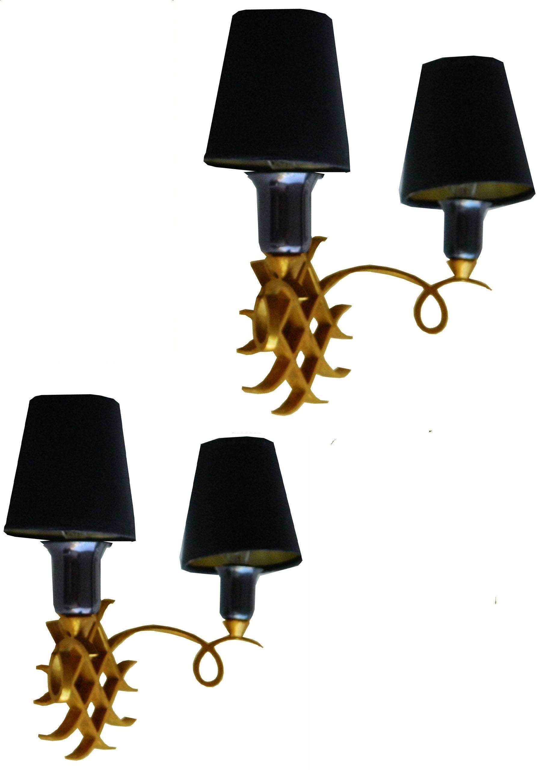 Pair of two-tone brass and gun metal sconces, In the style of Jules Leleu.
US rewired and in working condition.
60 watts max per bulb.
 Without shades : 7