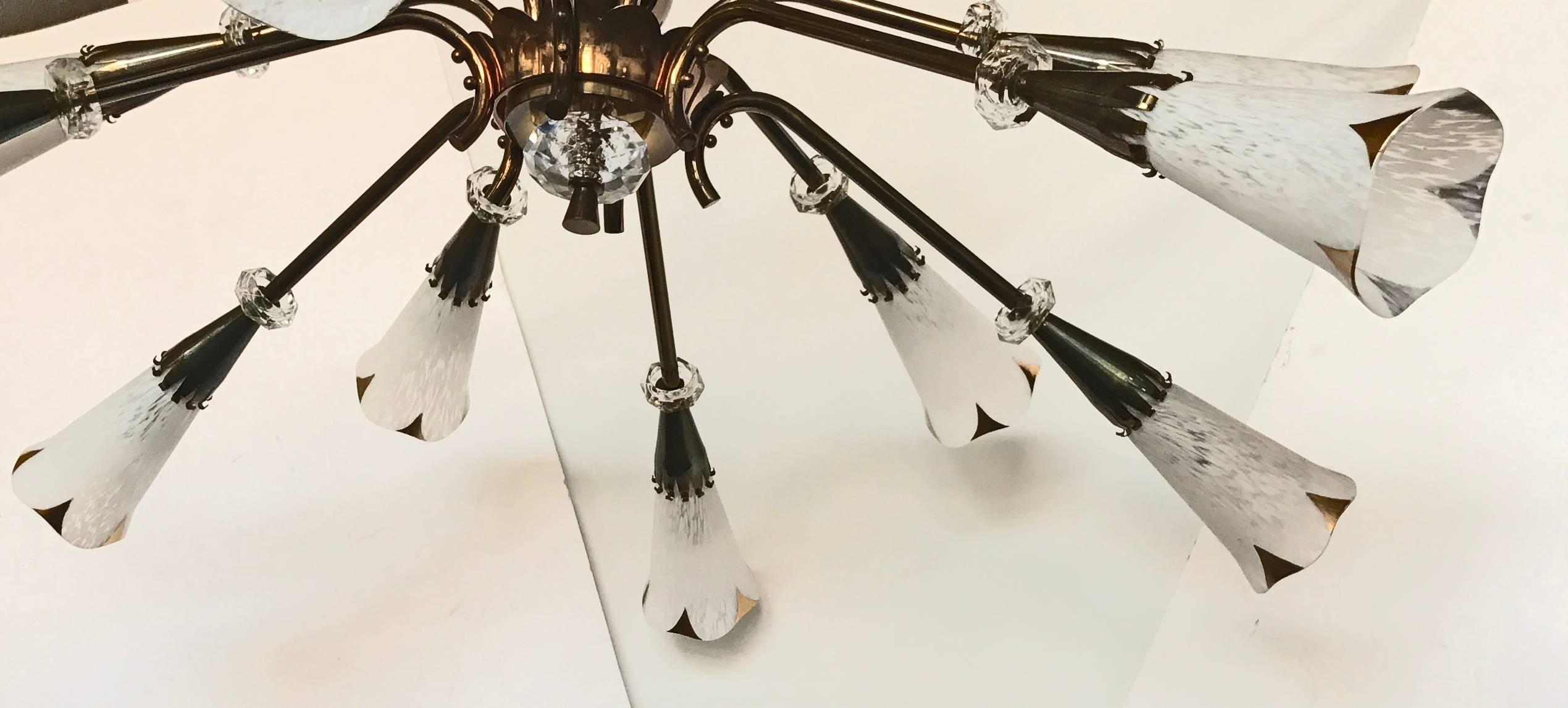 Superb 12 lights chandelier or flush mount made by Royal Lumières
Stem can be adjust to the needed dimension
12 light, 60 watt bulb max.
US rewires and in working