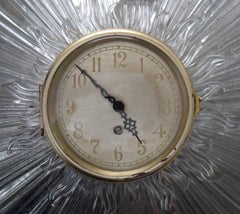 Sunburst Glass Clock by Laurence Colwell from the 1930s