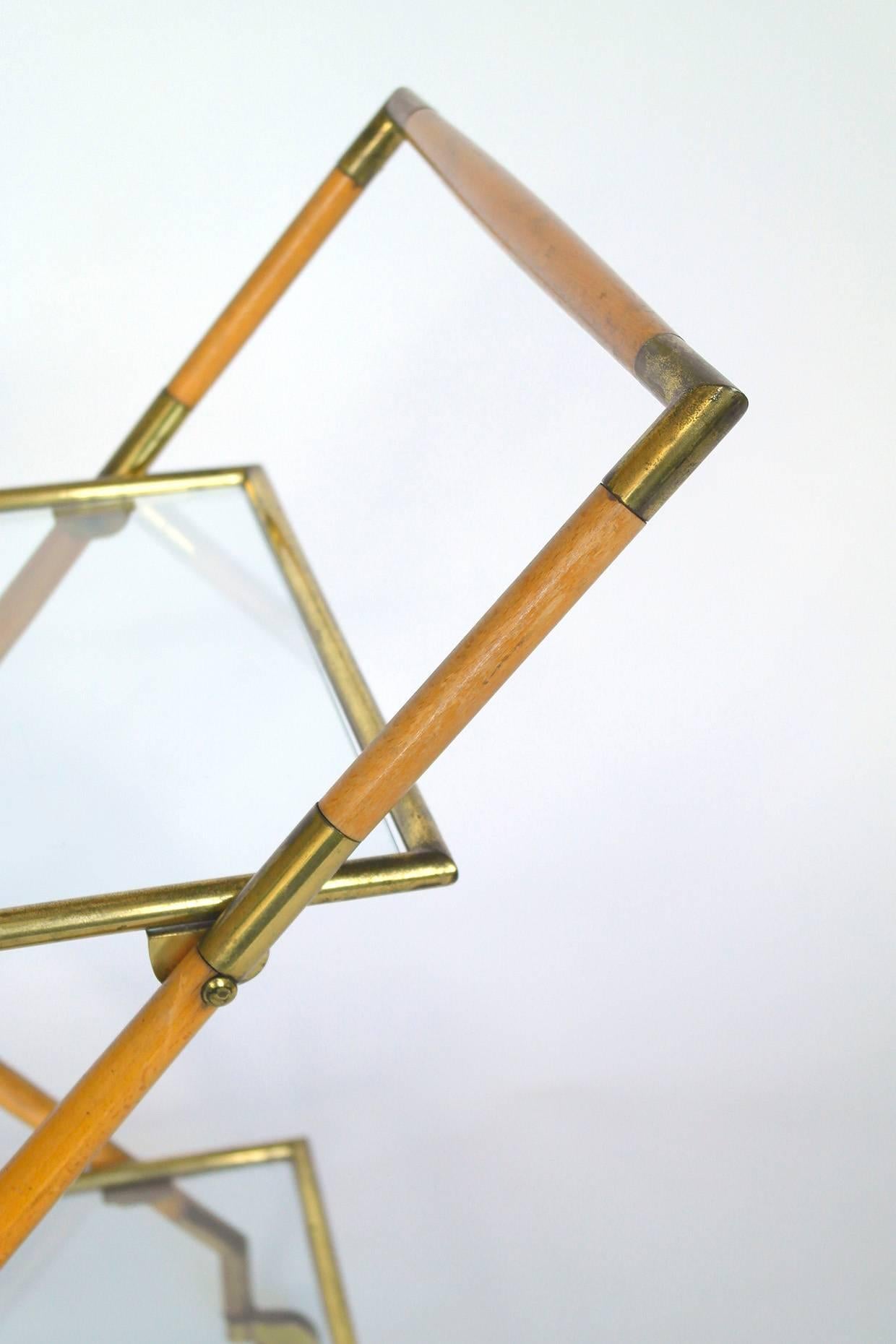 Mid-Century Modern Cesare Lacca, a brass and glass two tier bar cart, Italy c. 1950s For Sale