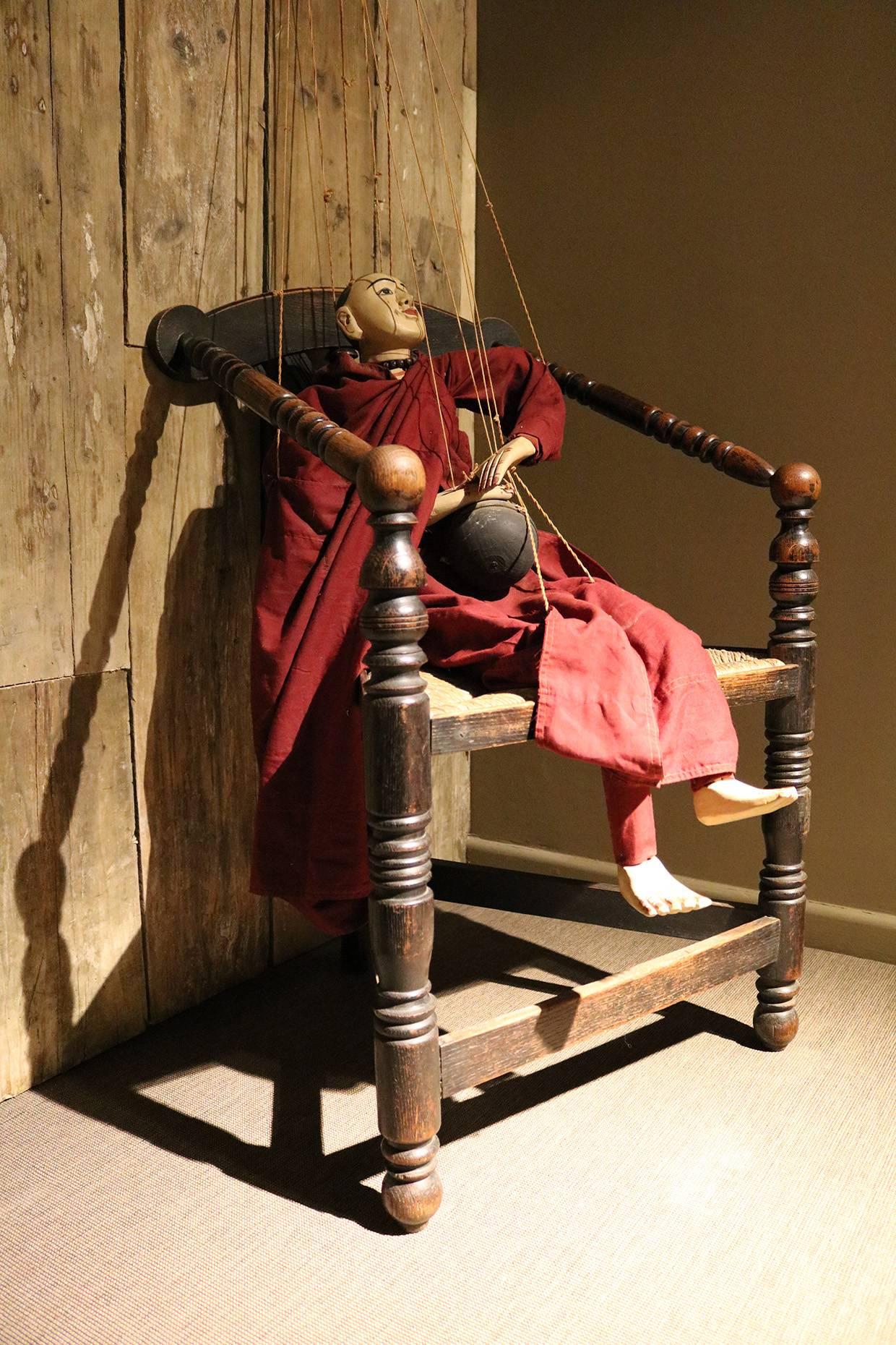 Unusual marionette in the form of a traditional Burmese monk with original details and carved and handprinted features