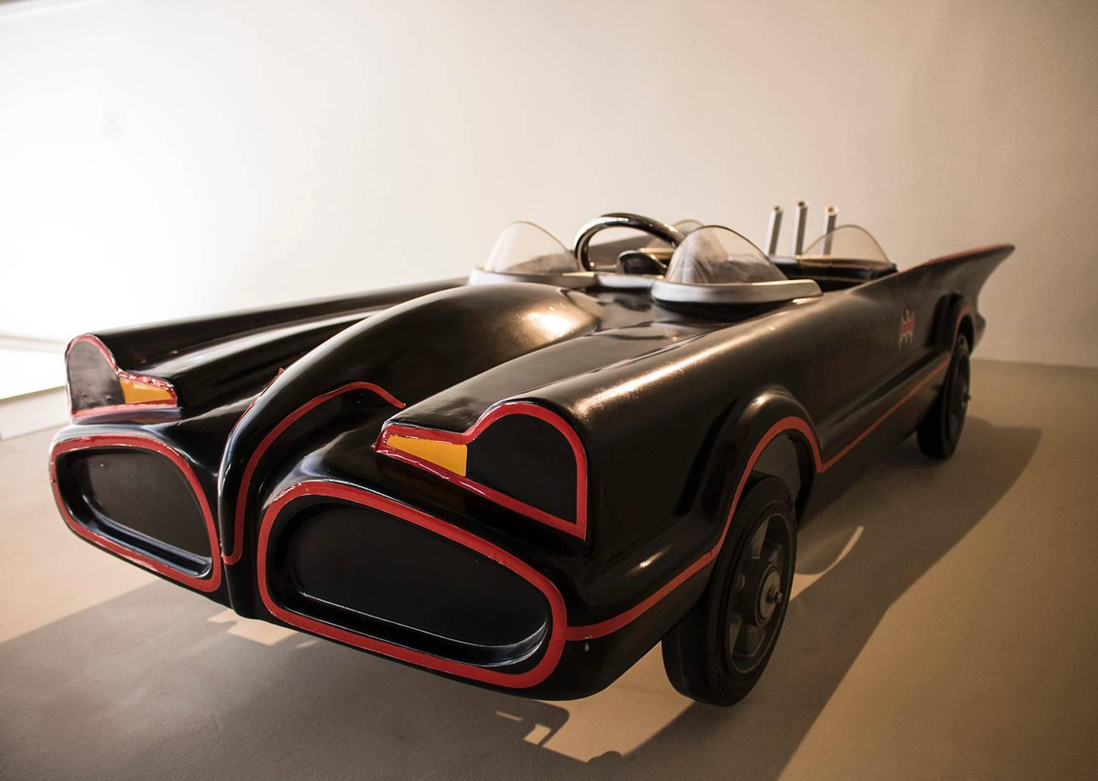 Based on the 1966 iconic crime crusher batmobile, this is a wonderful collectors piece for fans; pedal car with fibreglass shell and hand-painted trim.

  