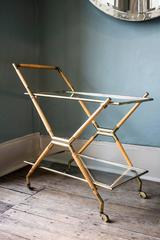 Cesare Lacca, a brass and glass two tier bar cart, Italy c. 1950s