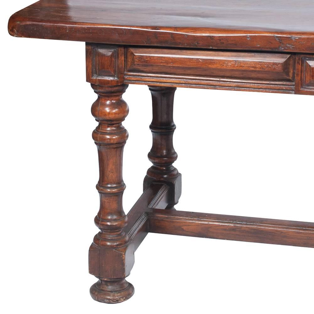 This English Country farmhouse table features a drawer at one end for storage...middle trestle for added support and side to leg supports as well. The apron clearance is 25.5