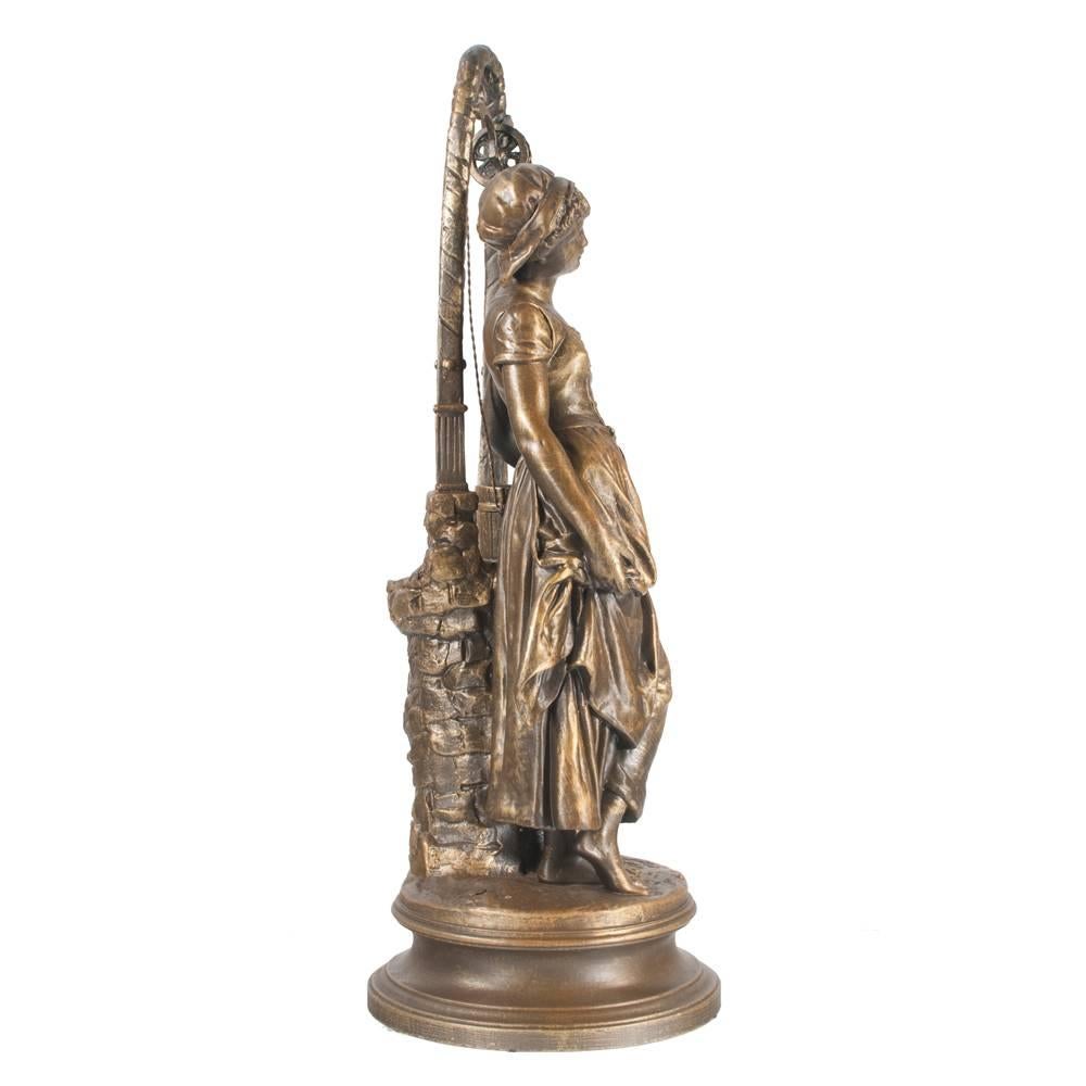 French spelter sculpture of a classical woman at the well, signed Henri Ple and with French foundry seal, circa, 1890. This beautiful sculpture is very intricately designed, adding distinct clarity to the character.