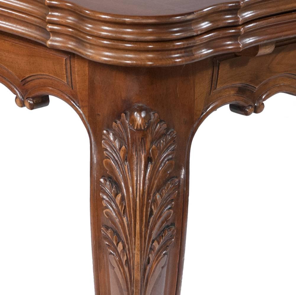 French walnut draw leaf dining table with parquetry top, scalloped and carved apron on cabriole legs with two hidden 27