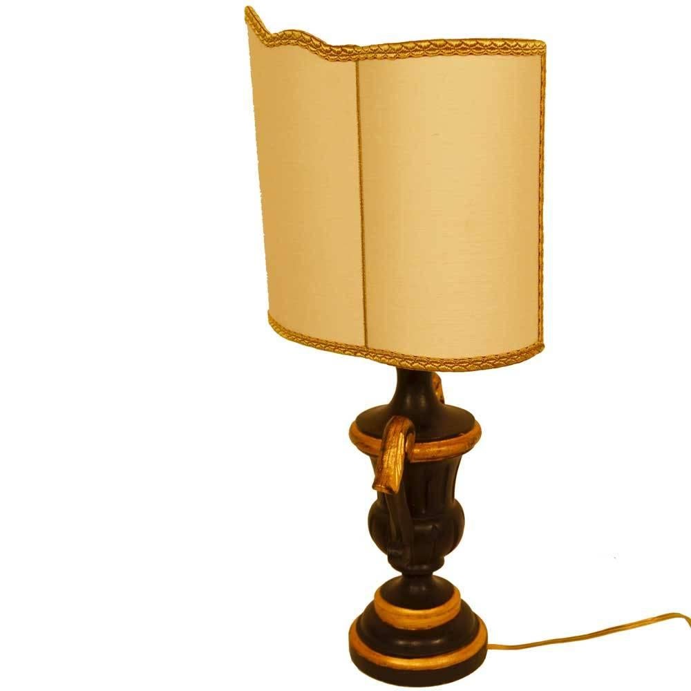 Pair of gold gilded black French lamps with the Classic French shield shades, trimmed in gold.