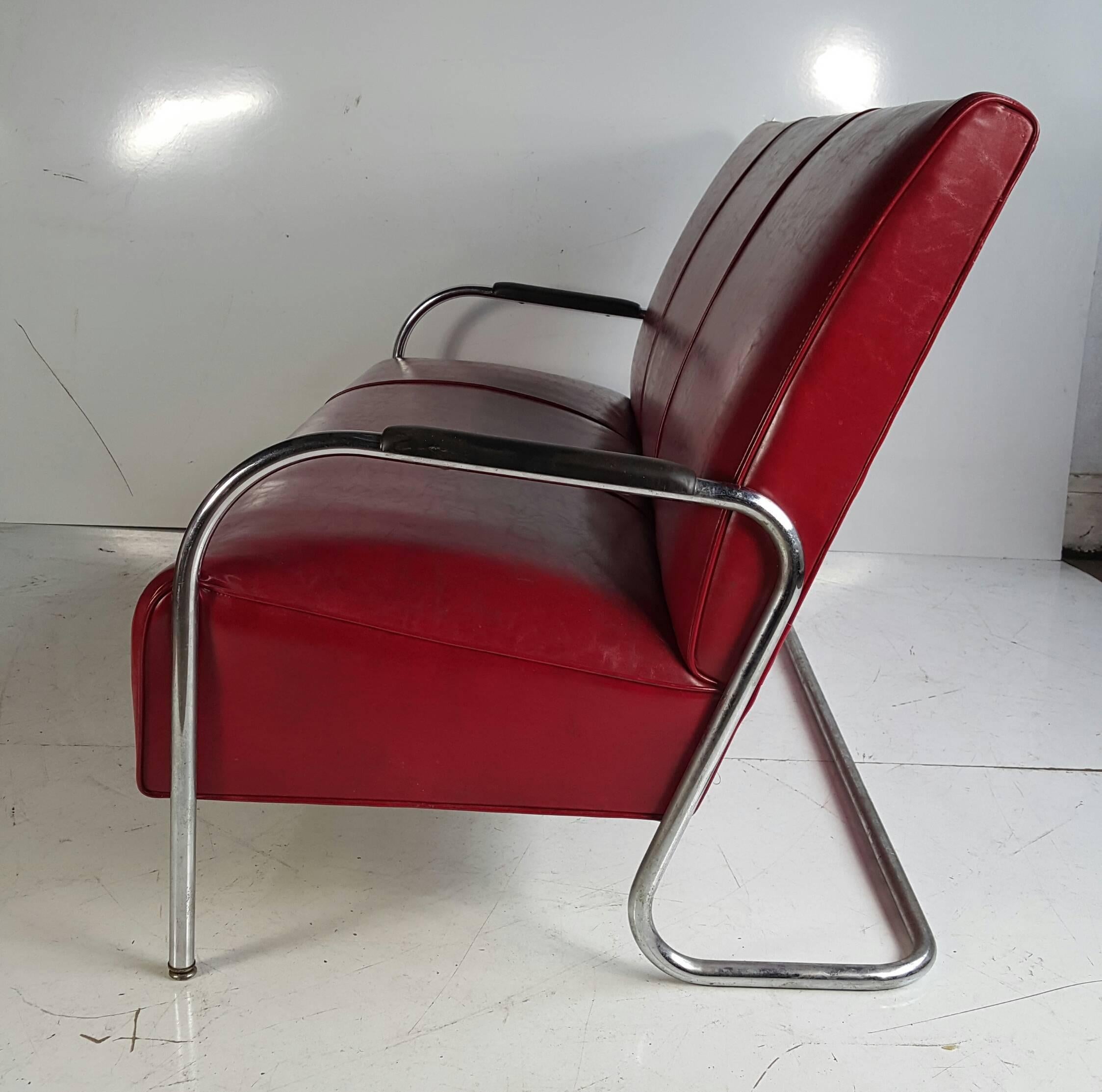 Wonderful American Art Deco three-seat sofa, designed by Wolfgang Hoffmann manufactured by Howell Furniture Co, amazing original condition, Classic Art Deco modernist styling.