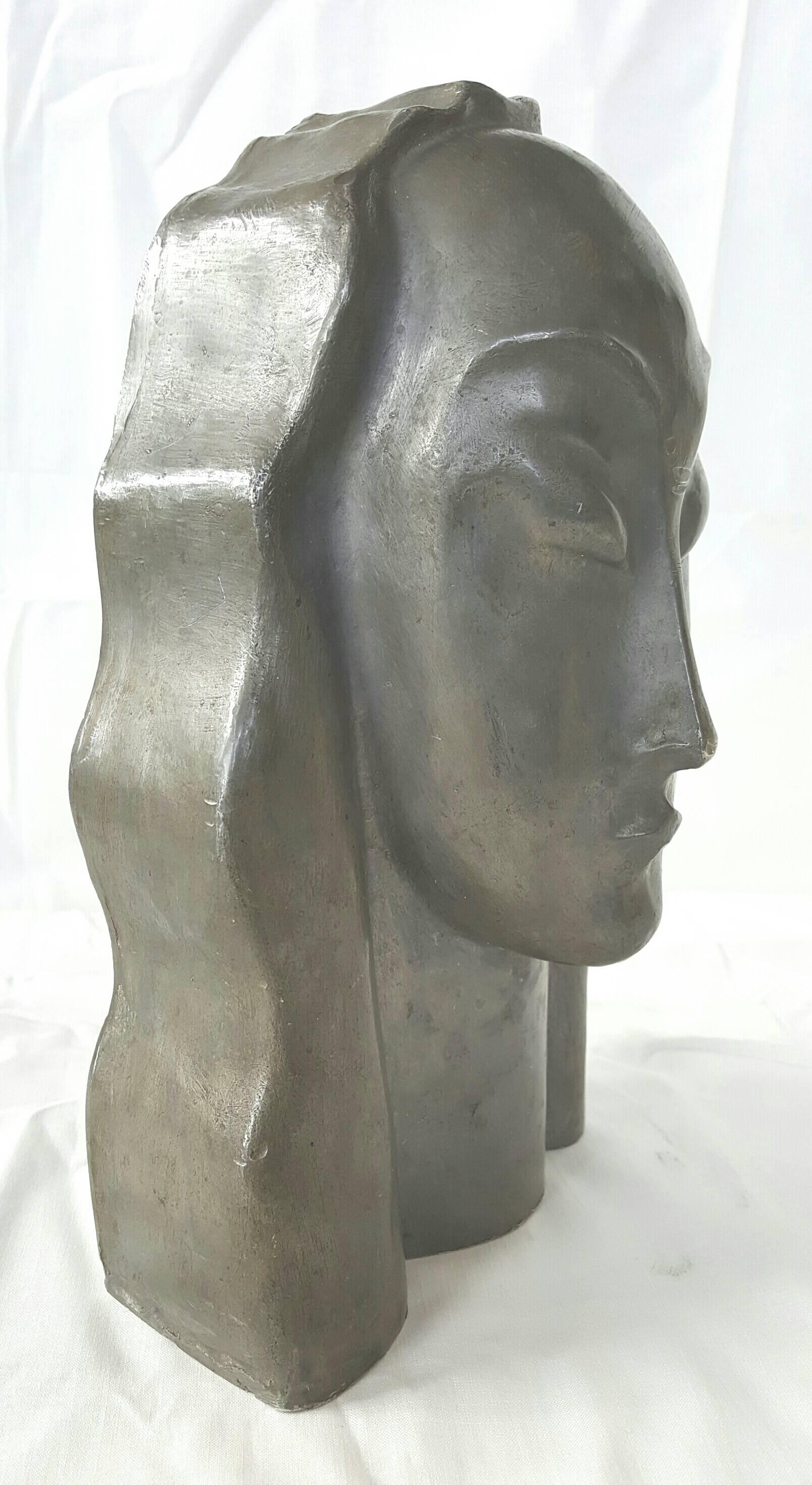 Gorgeous Weiner Werkstatte stylized woman head, molded, formed zinc. Very unusual medium, enhance any Art Deco, modernist environment.