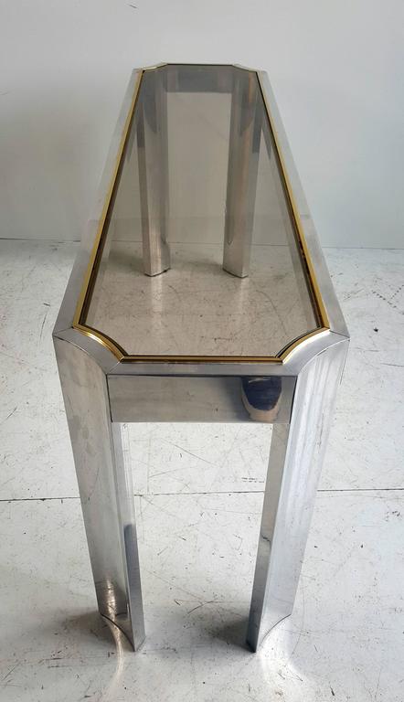 Elegant aluminium, brass and glass console or sofa table, great quality and exceptional, sculptural design. Fit seamlessly into any modernist, antique, contemporary, eclectic environment.