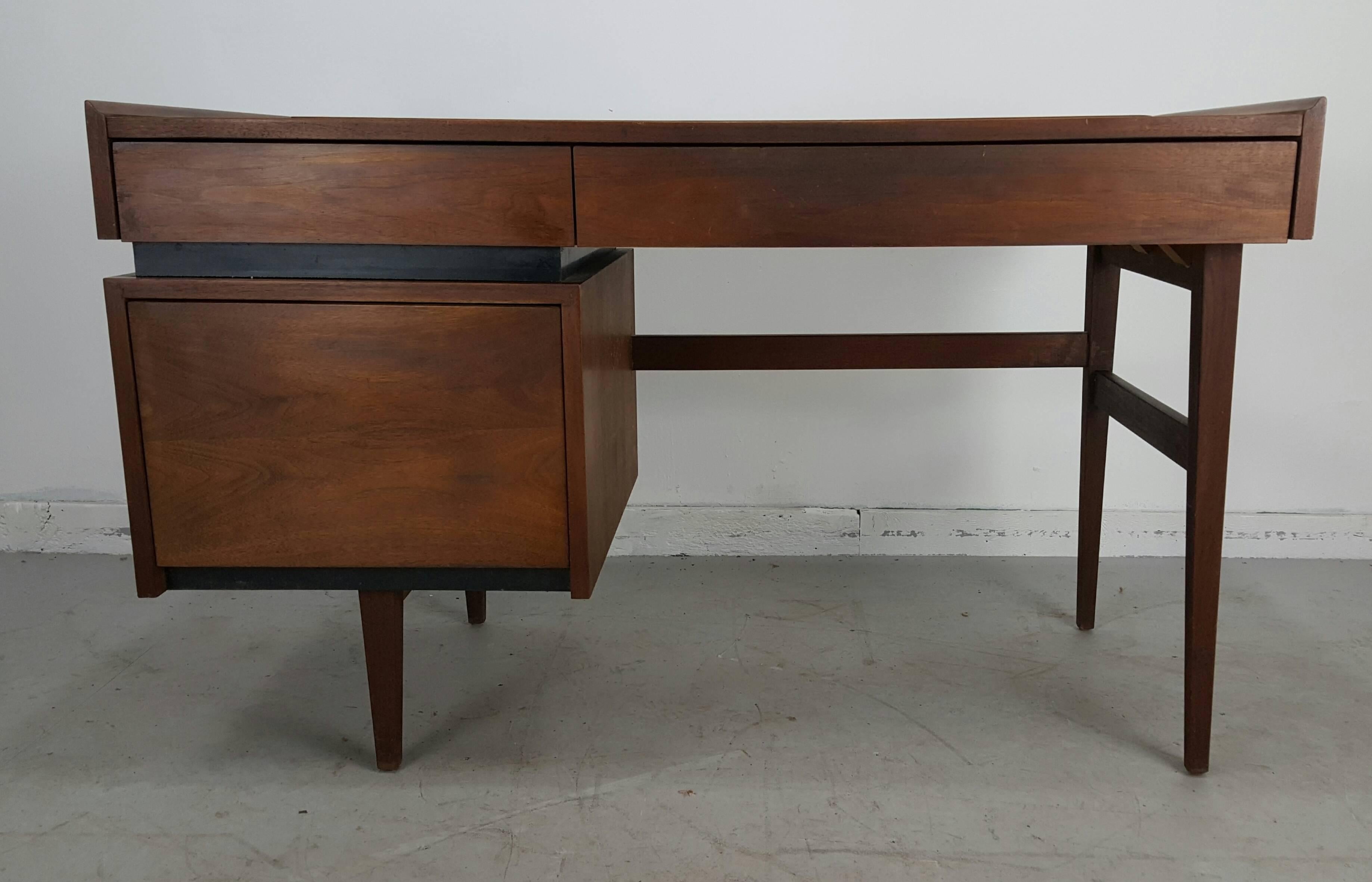 Classic Mid-Century Modern oiled walnut desk designed by Milo Baughman for Dillingham. Beautiful grained oiled walnut finish, superior quality. Features two drawers over generous size file drawer. Finished back side, versatile room placement,
