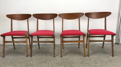 Set of Four Sculptural Walnut Dining Chairs, Denmark by Kurt Ostervig