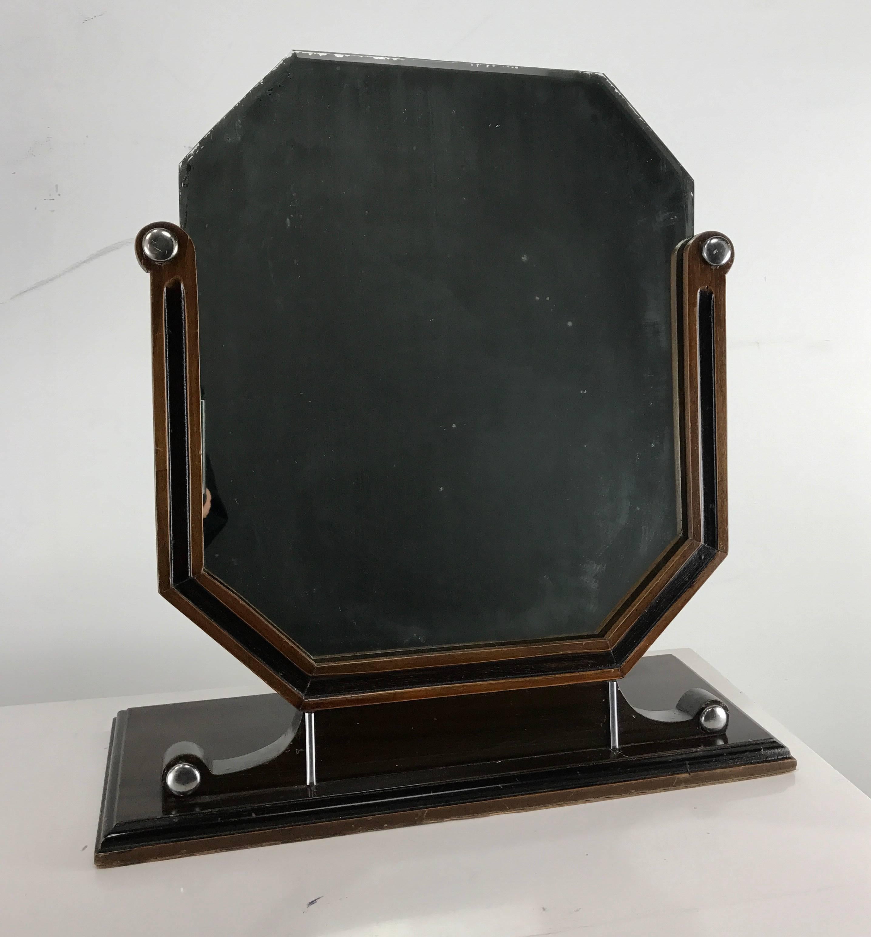 Beautiful Art Deco dresser mirror in wonderful original condition. 

Walnut wood with beautiful chrome accents with black lacquer trim.