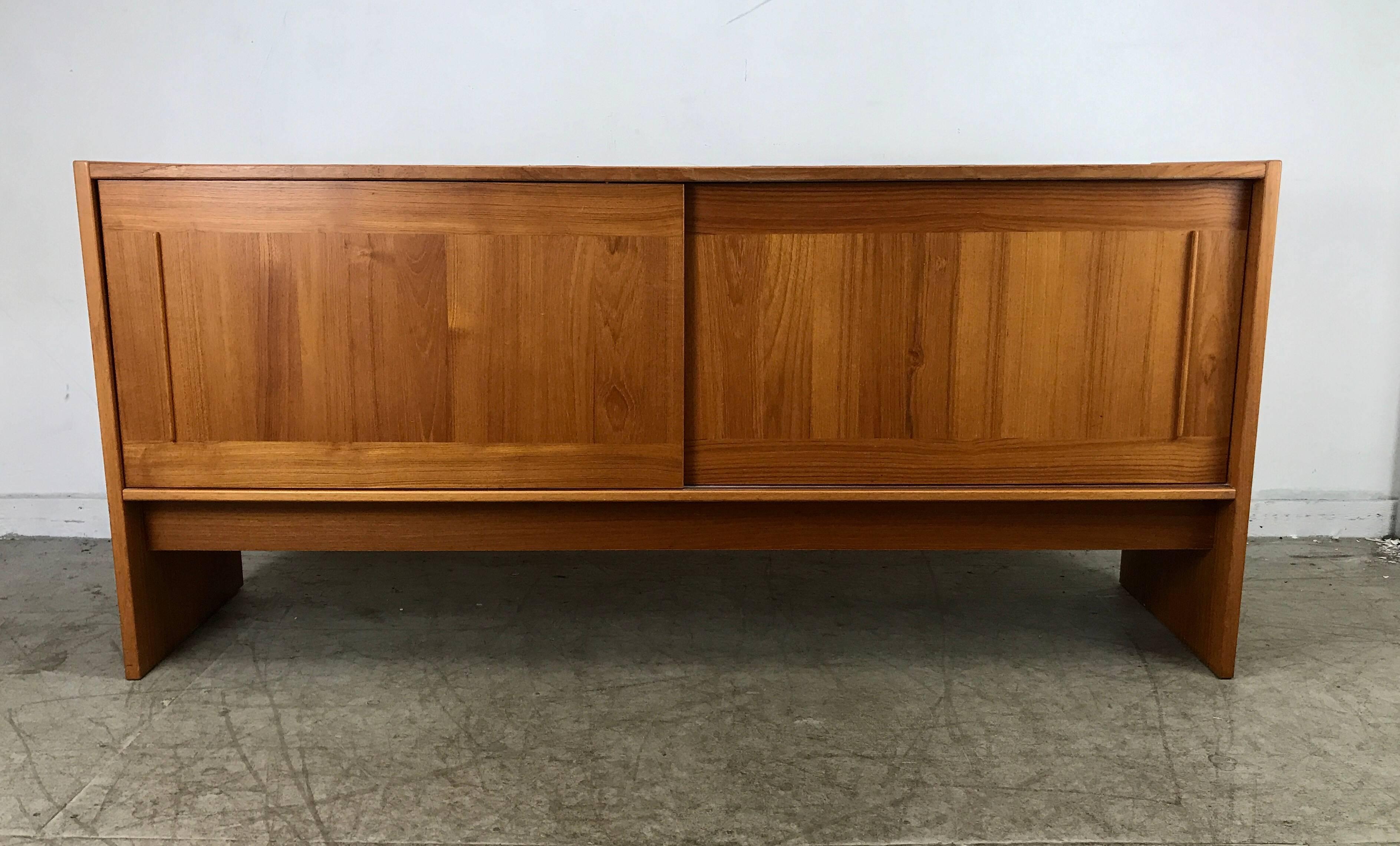 Danish Modern teak and slate tile top credenza or sideboard by Gangso Moblier, Denmark, Featuring two sliding doors and interior shelves. Simple ,elegant design, warm, rich colors to original inset slate, hand delivery available to New York City or