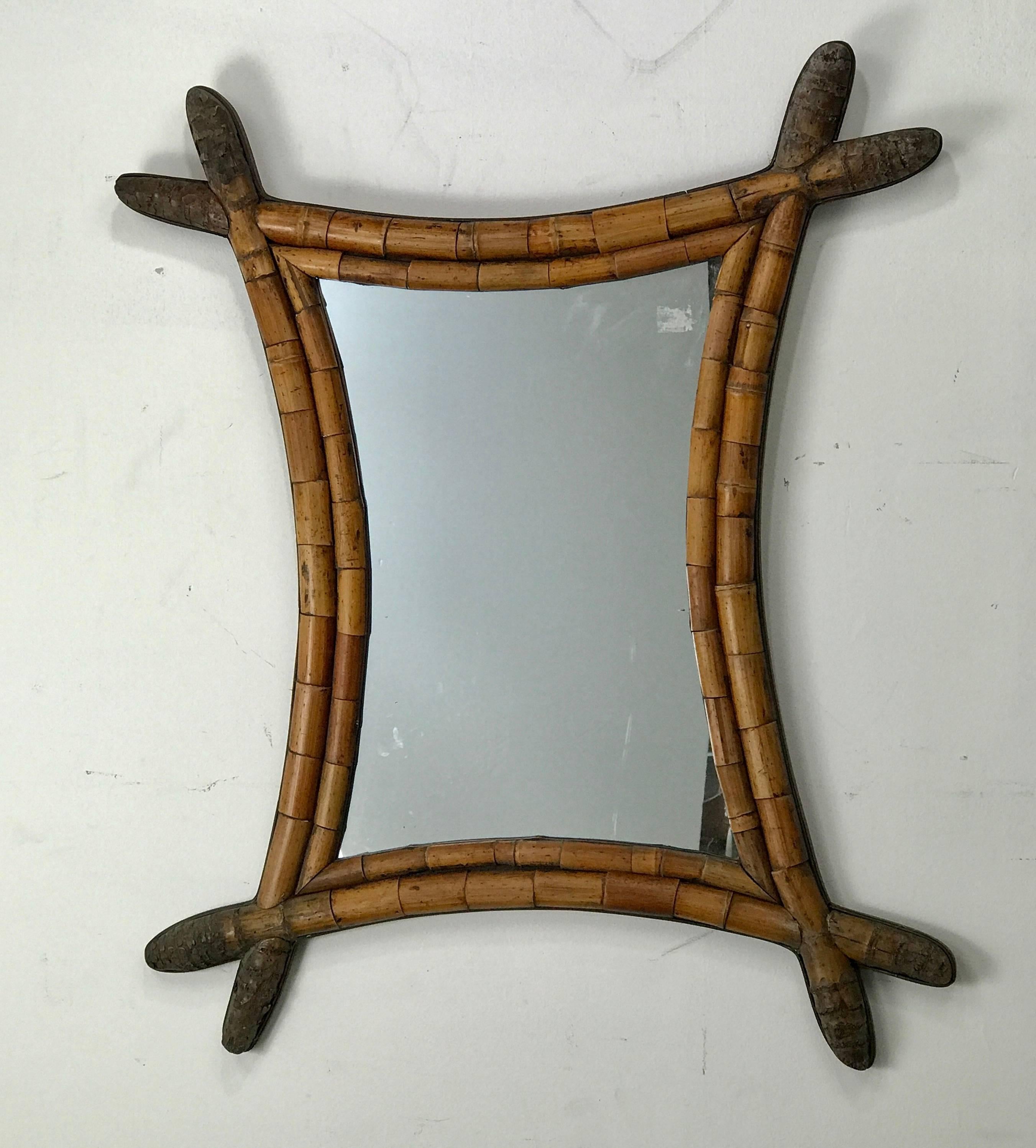 Early and unusual Asian style bamboo mirror, stunning design, wood wrapped trim. Wonderful color and surface, hang vertically or horizontally.