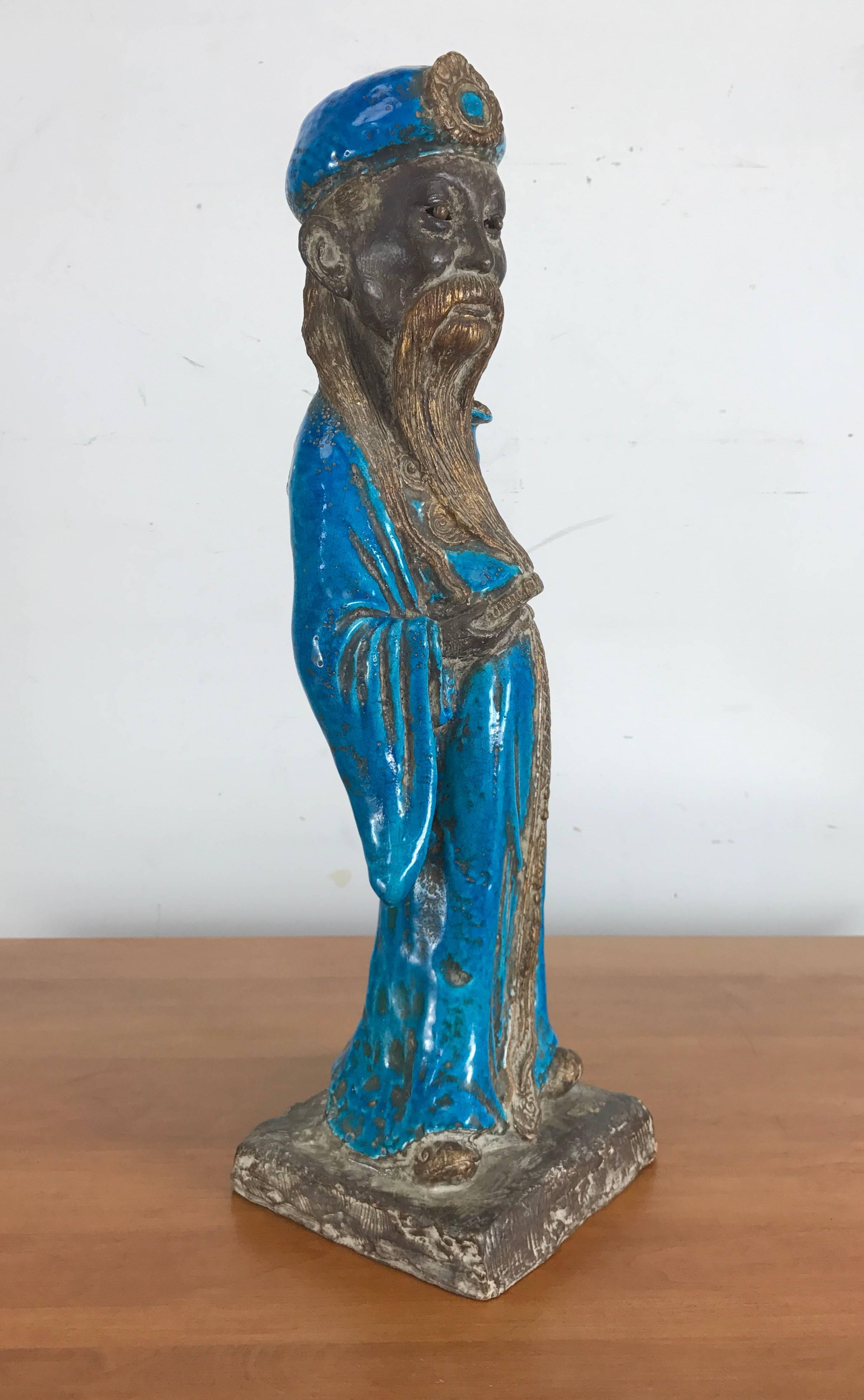 Zaccagnini Mid-Century Modern Italian Art Pottery chinaman statue. Beautiful blues and golds, pierced pottery eyes, extremely well executed. Detailed,.