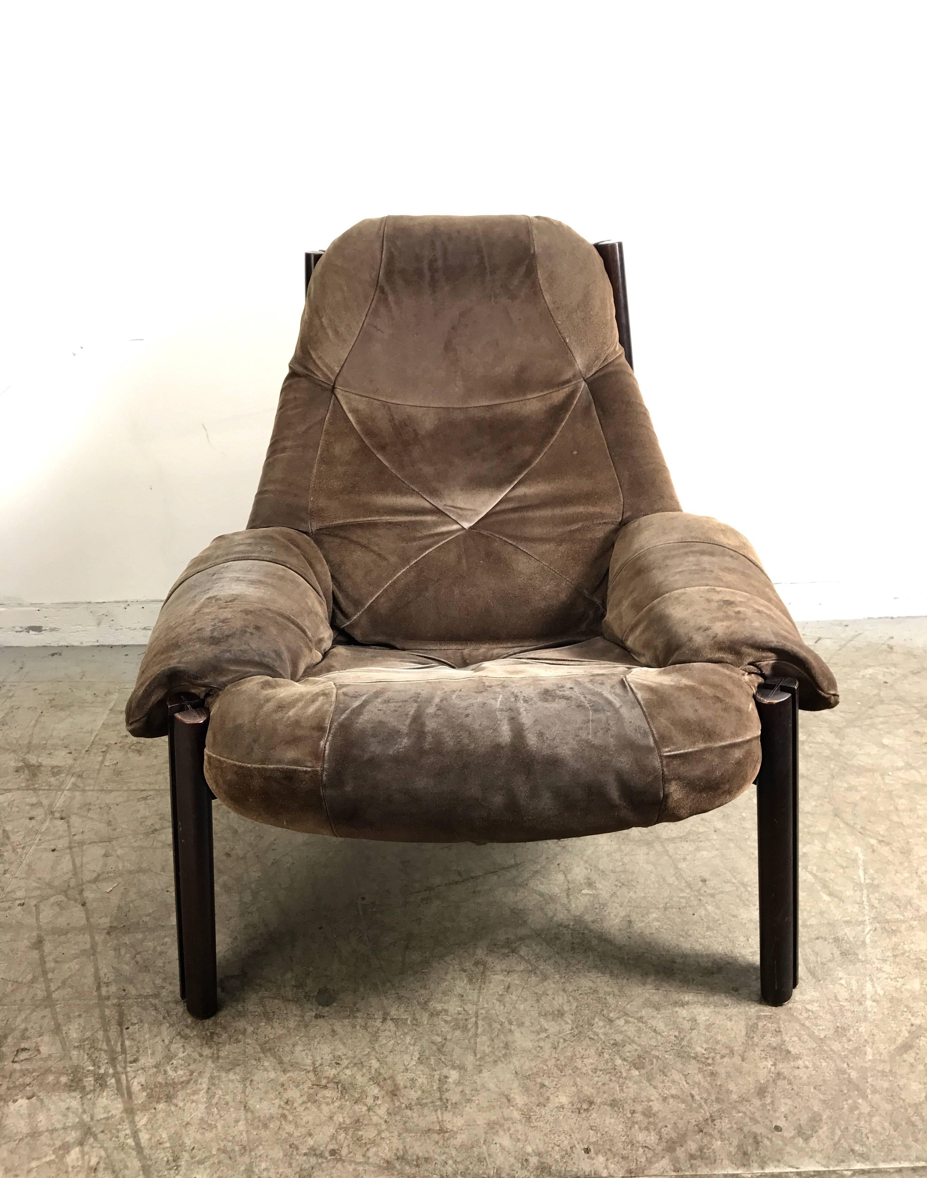 Modernist rosewood and suede lounge sling chair by Percival Lafer, circa 1967, made in Brazil, retains original suede cover.