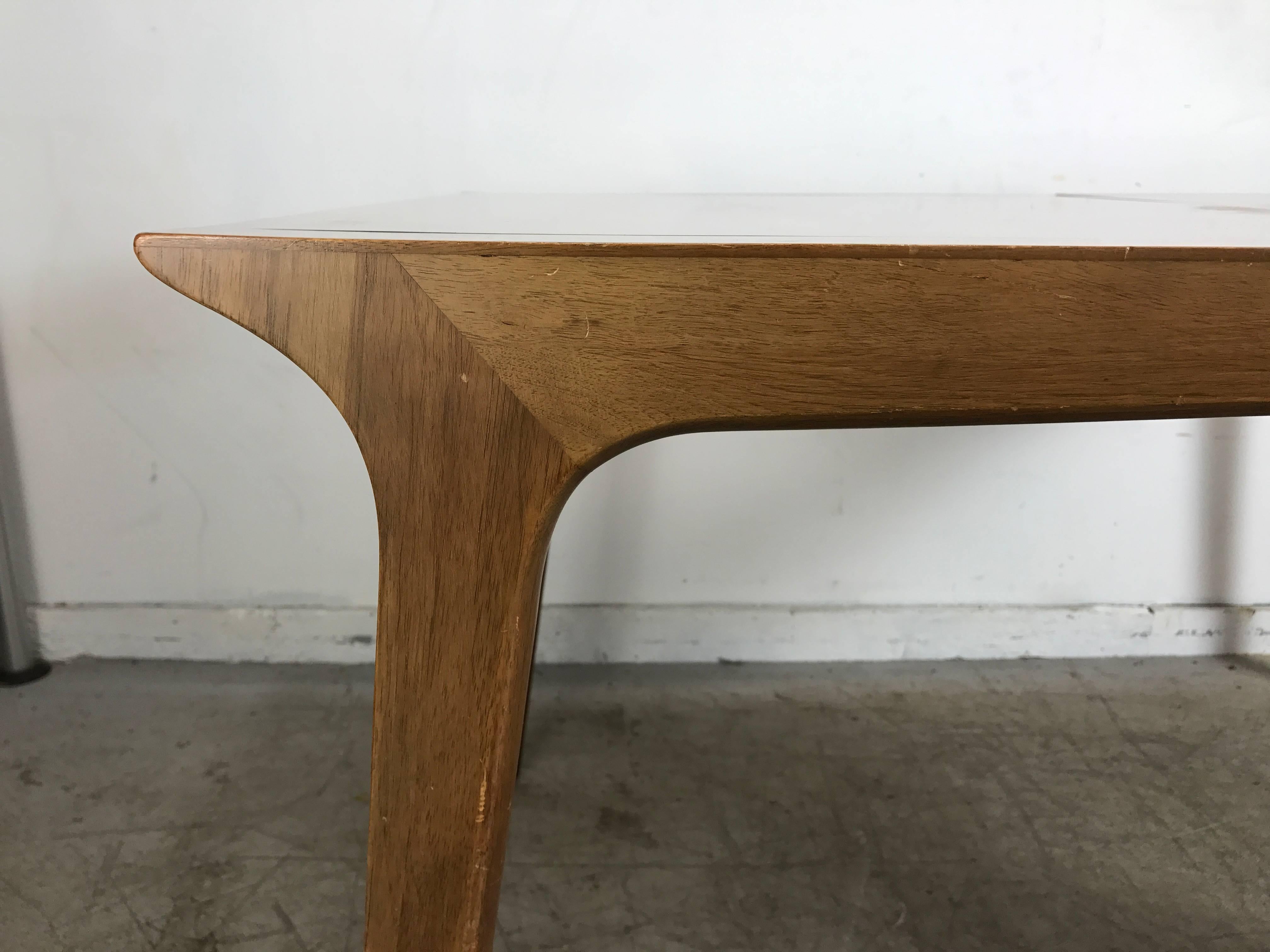 Drexel profile dining table designed by John Van Koert, Classic modernist design, Superior quality and construction, Tables retains three 12 inch leaves and opens to an impressive 90 inches.