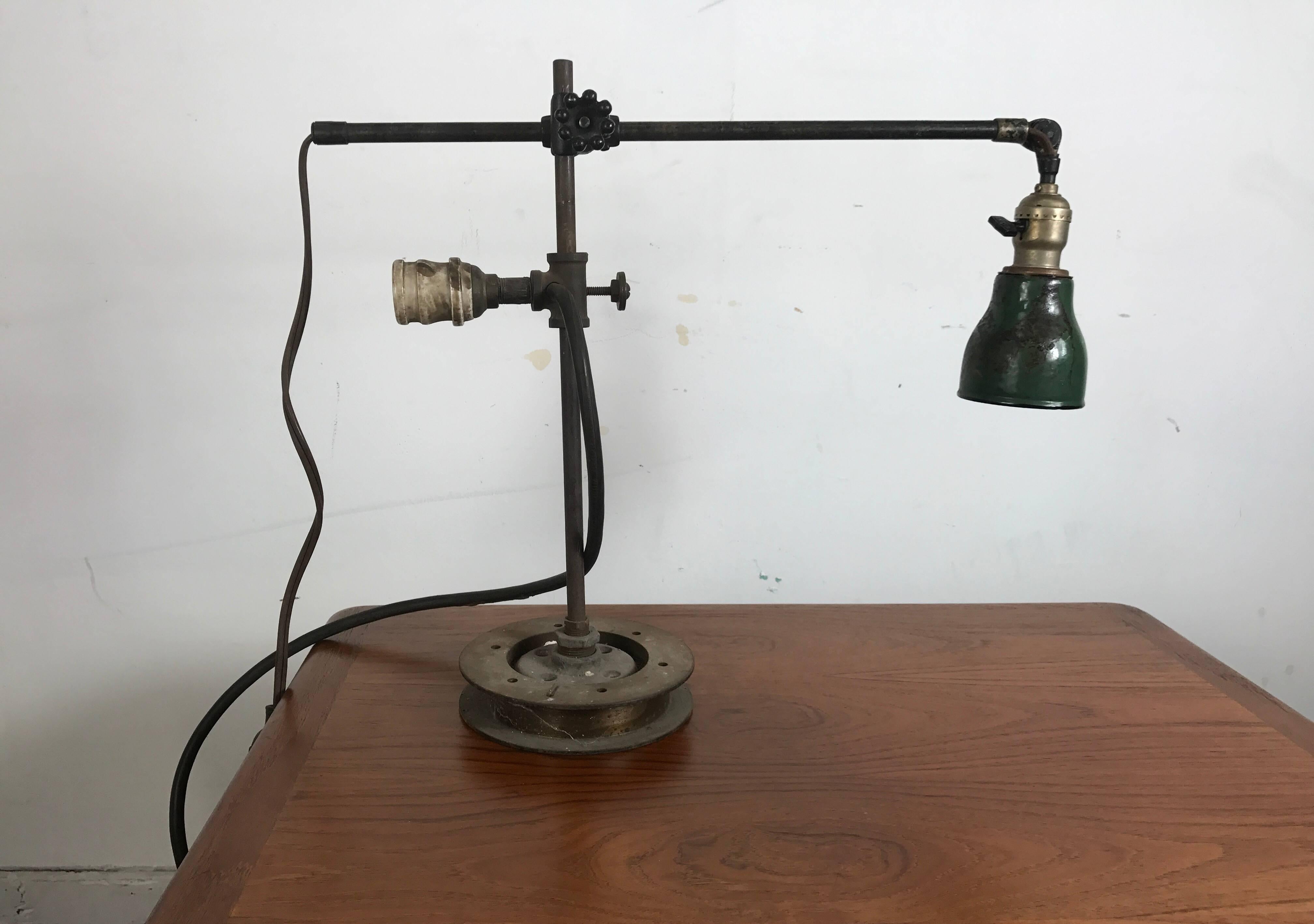 O C White Industrial desk lamp with additional light fixture. Fully adjustable. Retains original green metal task shade, mounted to custom machined base.