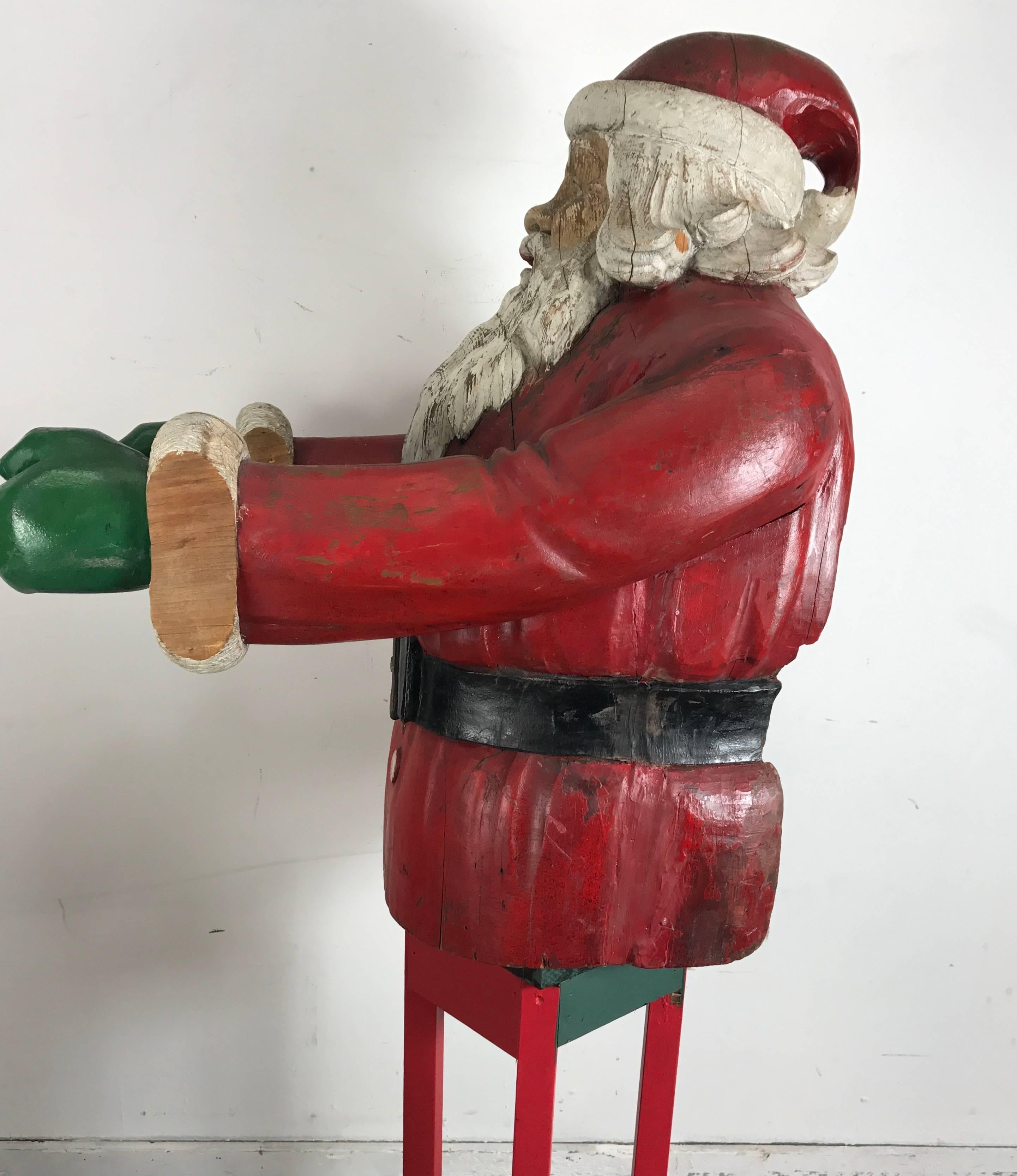 American Turn of the Century Life Size Carved Wood and Painted Folk Art Santa Sculpture