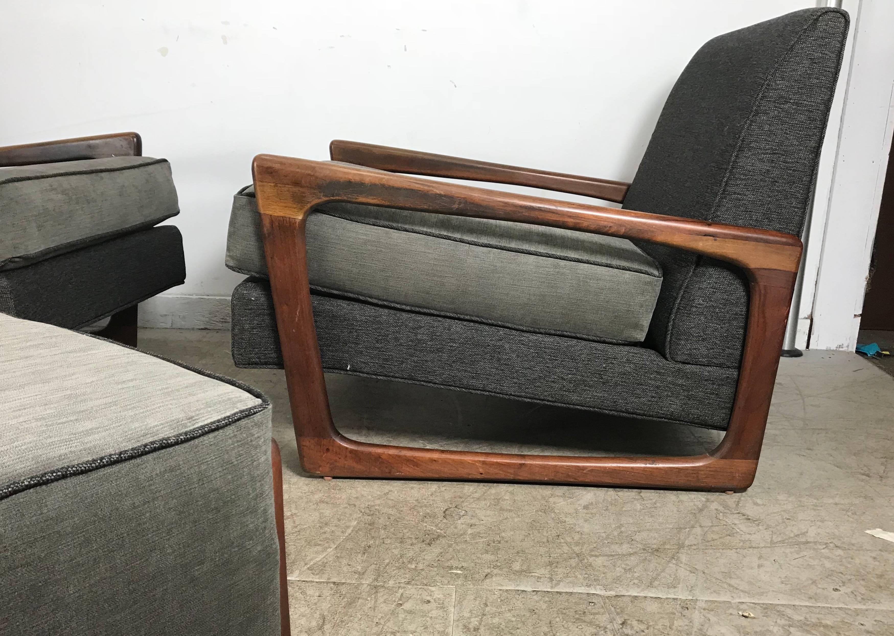 Classic Mid-Century Modern sculptural walnut low profile his and hers lounge chairs and matching ottoman designed by Adrian Pearsall for his company Craft Associates, Stunning design, as fresh today as the day they were produced, Recently