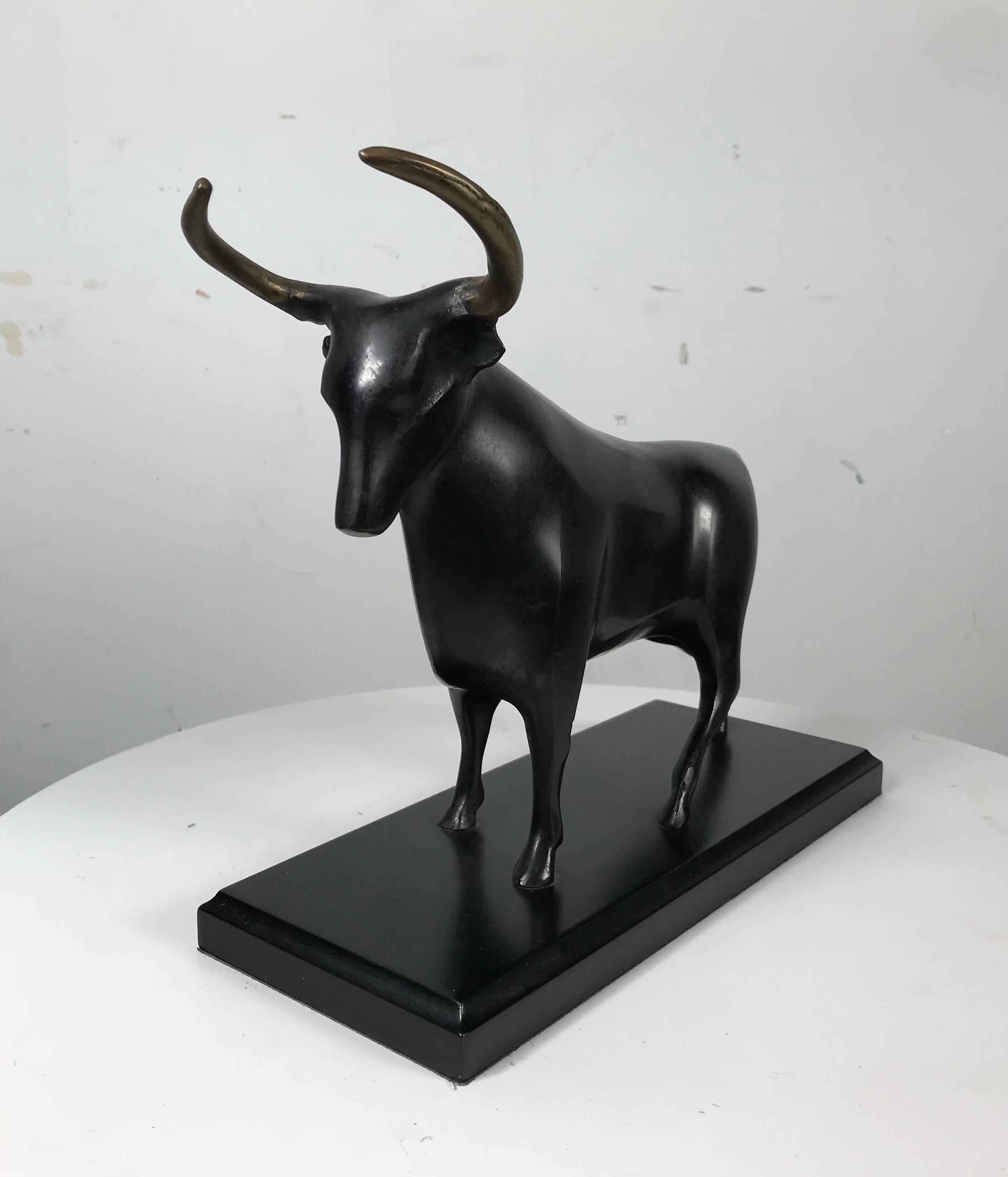 Stylized bronze bull table sculpture, beautifully executed, quality casting.