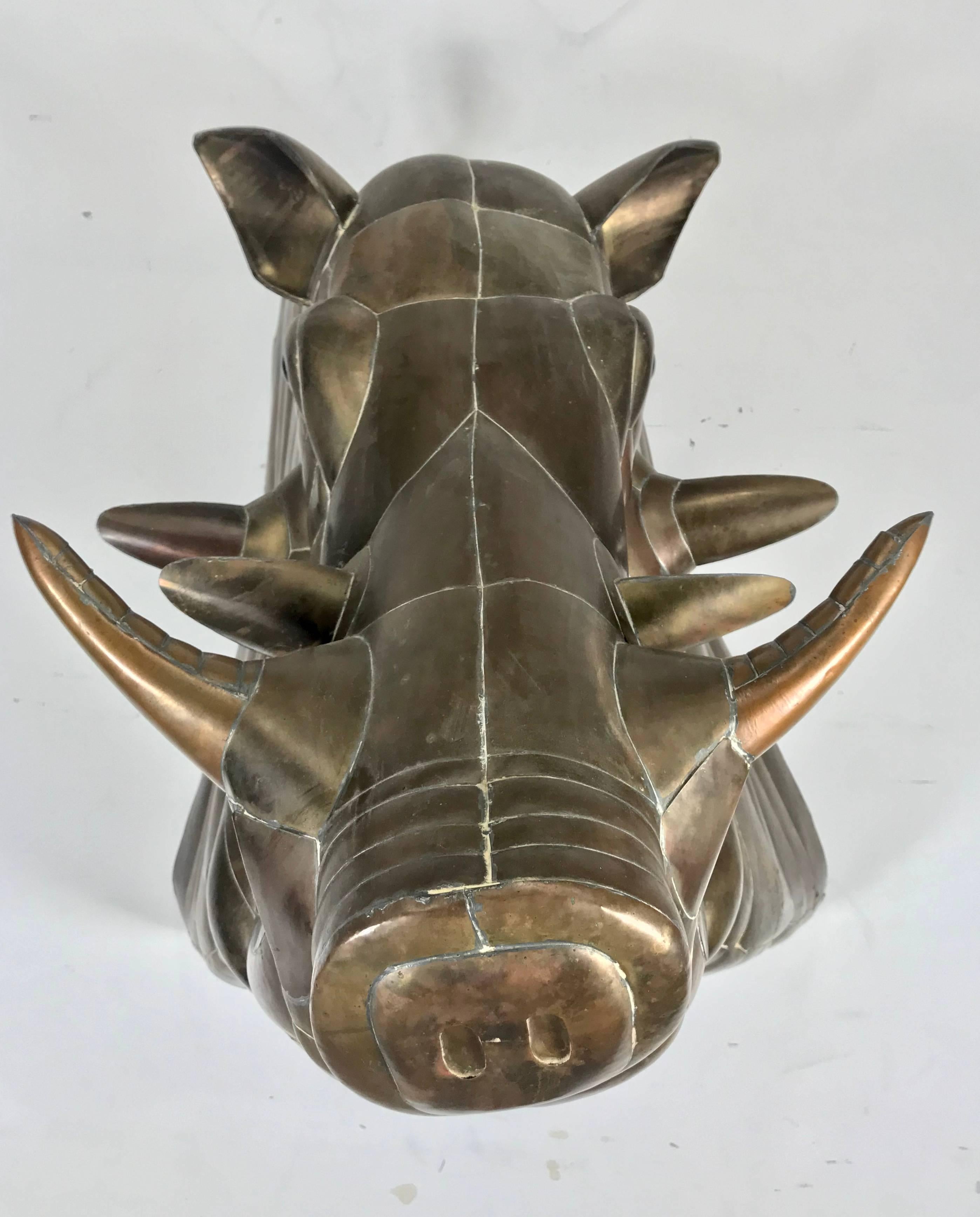 Monumental Sergio Bustamante copper and brass Warthog wall sculpture.
Sergio Bustamante is a Mexican artist and sculptor. Though born in Culiacan, Sinaloa, Mexico, Sergio Bustamante has lived in the Guadalajara area since early childhood. In his