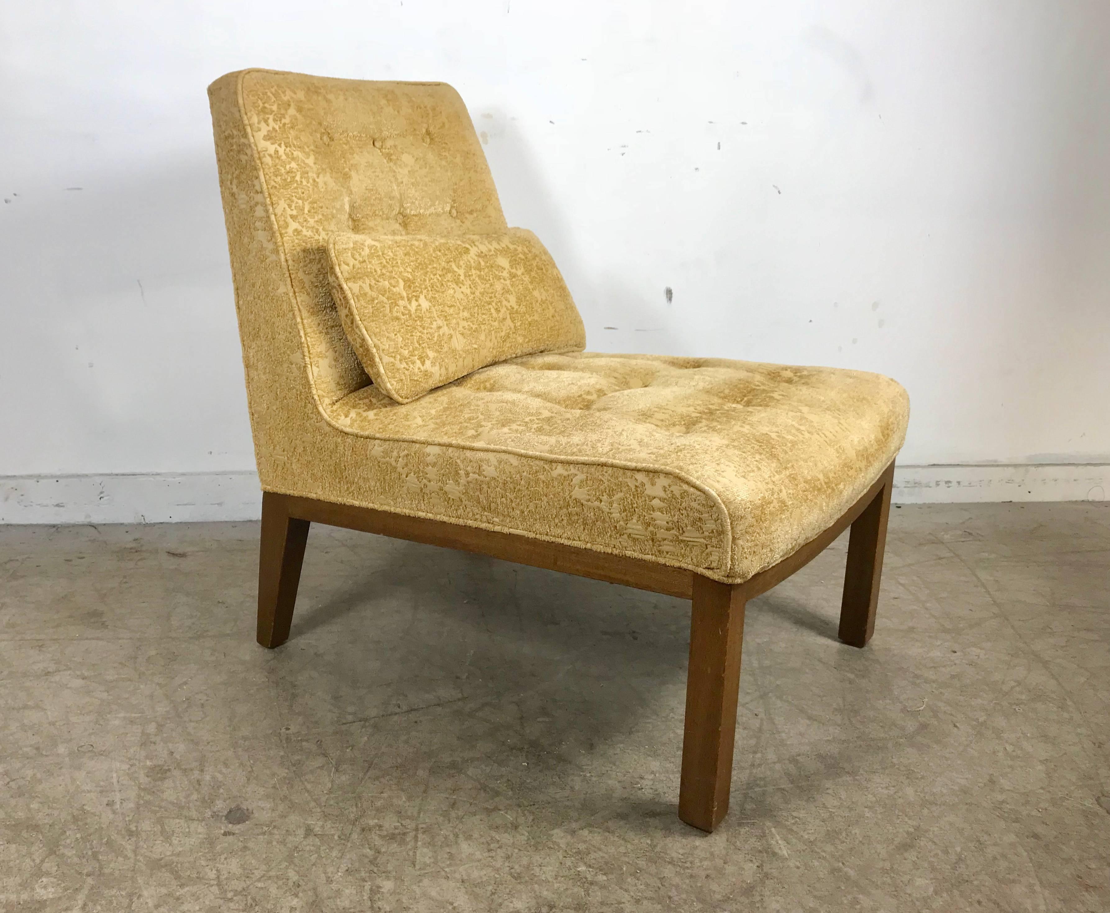 Classic modern slipper chair designed by Edward Wormley for Dunbar. Retains original fabric in nice usable condition, also retains original 