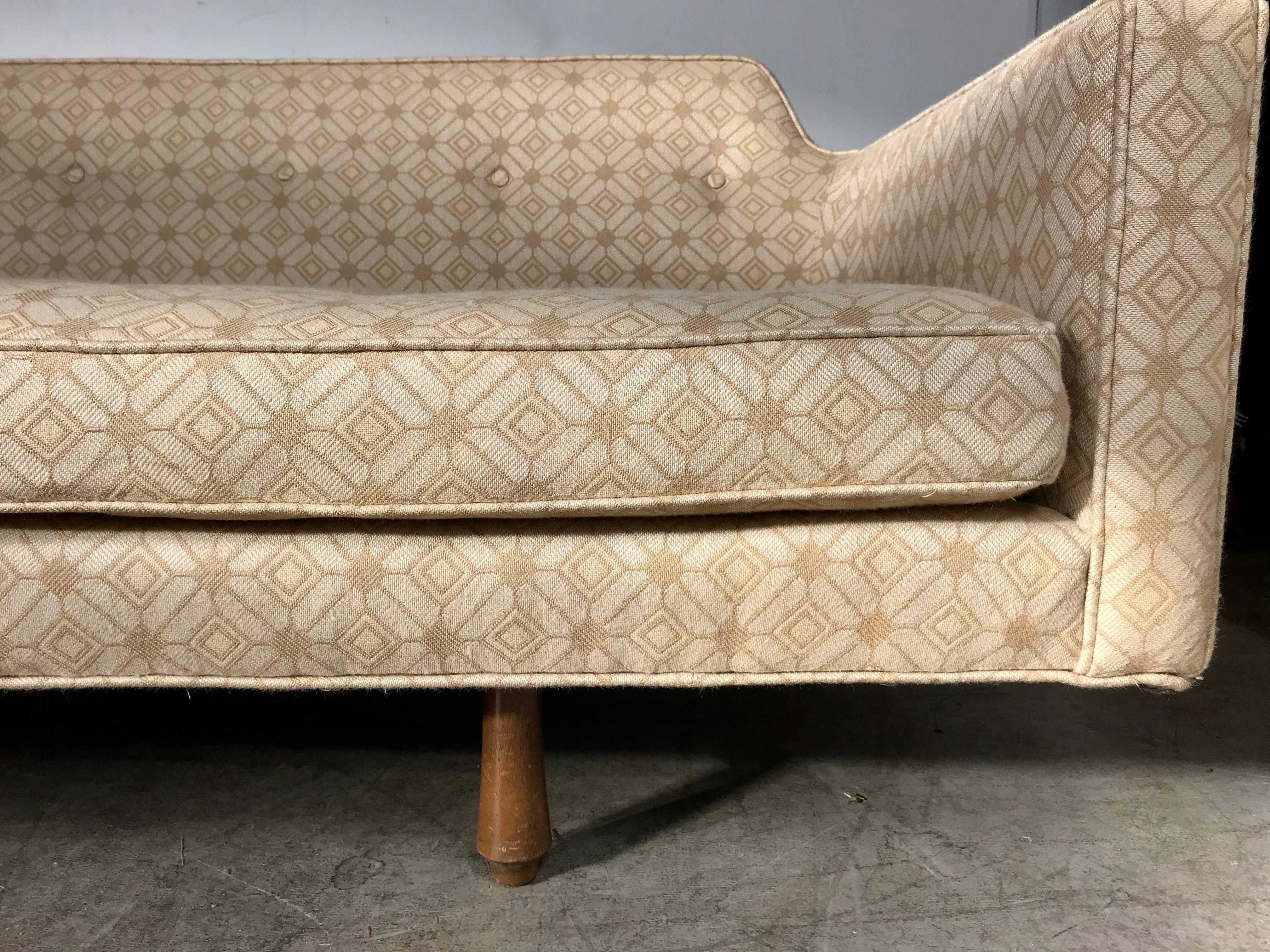 Modernist sofa designed by Edward Wormley for Dunbar, Wonderful example, down cushions, Retains fabulous original fabric in nice condition. Sensuous graceful lines, Hand delivery avail to New York City or anywhere en route from Buffalo New York.