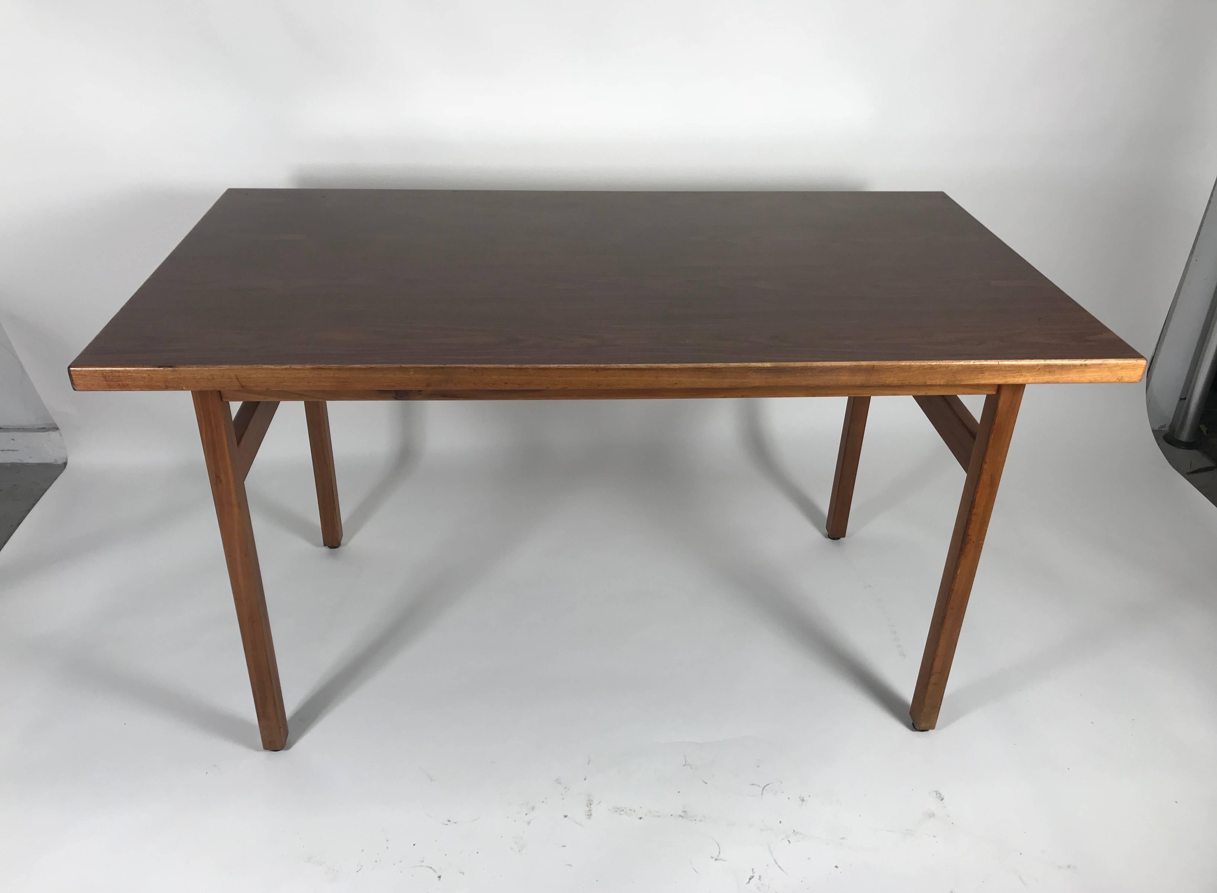 Classic Modernist table or desk designed by Jens Risom,, Stunning sleek ,simple ,elegant design. Hand delivery avail to New York City or anywhere en route from Buffalo New York.