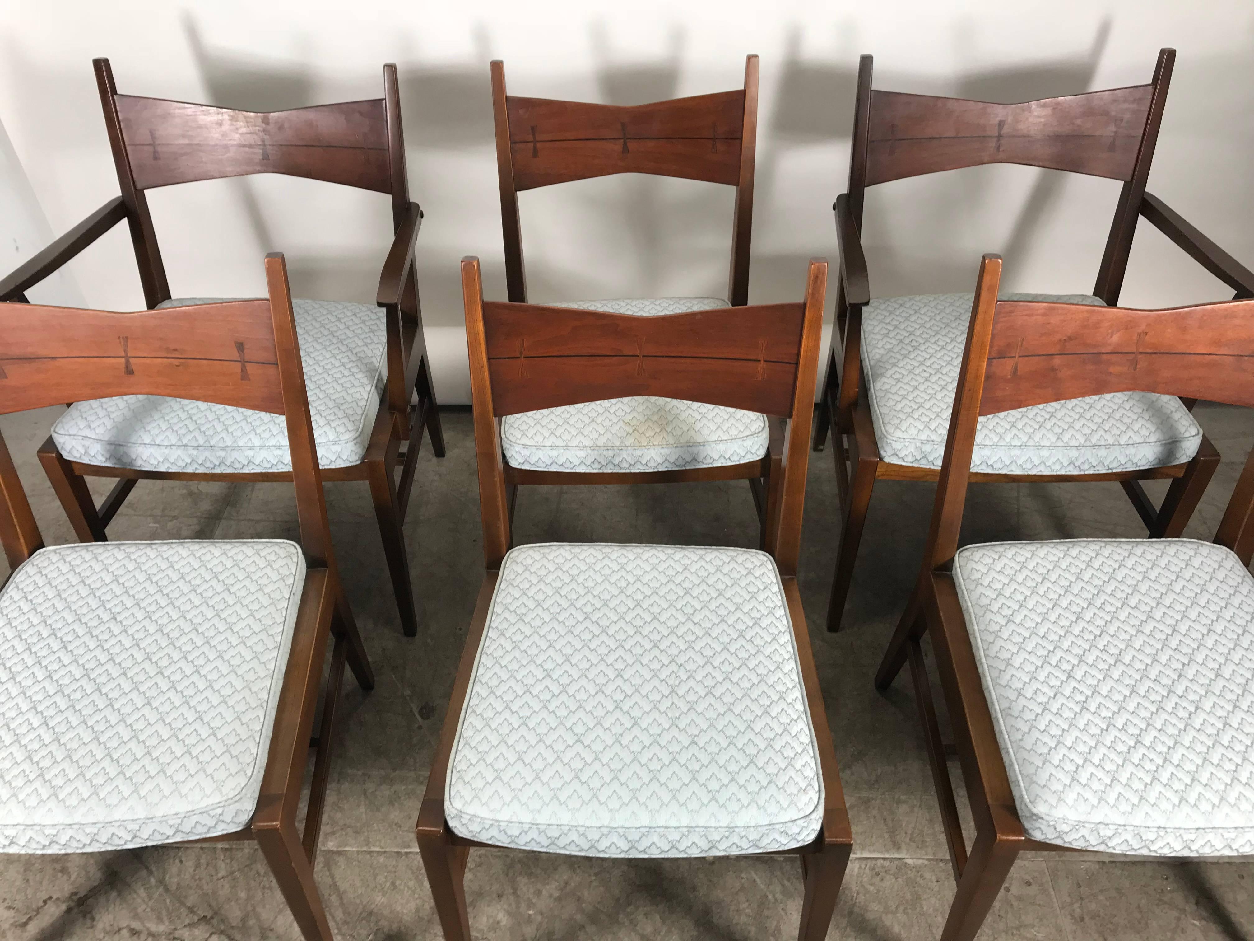 Set of six Mid-Century Modern dining chairs, lane tuxedo line, bow tie backs, very reminiscent of classic design by Paul McCobb Chairs in walnut, rosewood butterfly inlay detail, structurally sound, quality construction, Classic modernist design.
