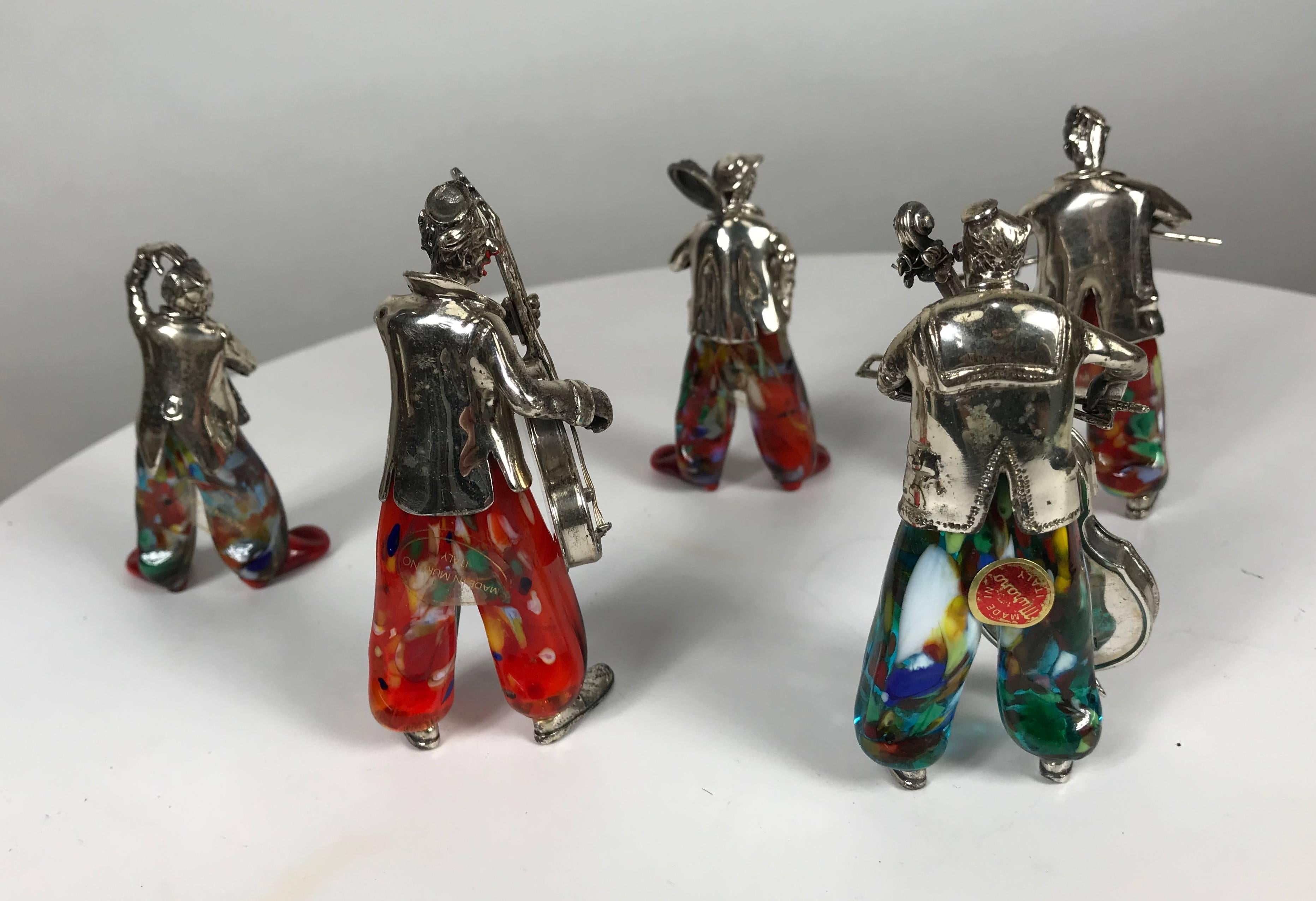 Set of five Murano glass and sterling silver musical clowns by Vittorio Angini,, charming set with stunning detail, retain original silver plaque signatures and made in Murano Italy labels.