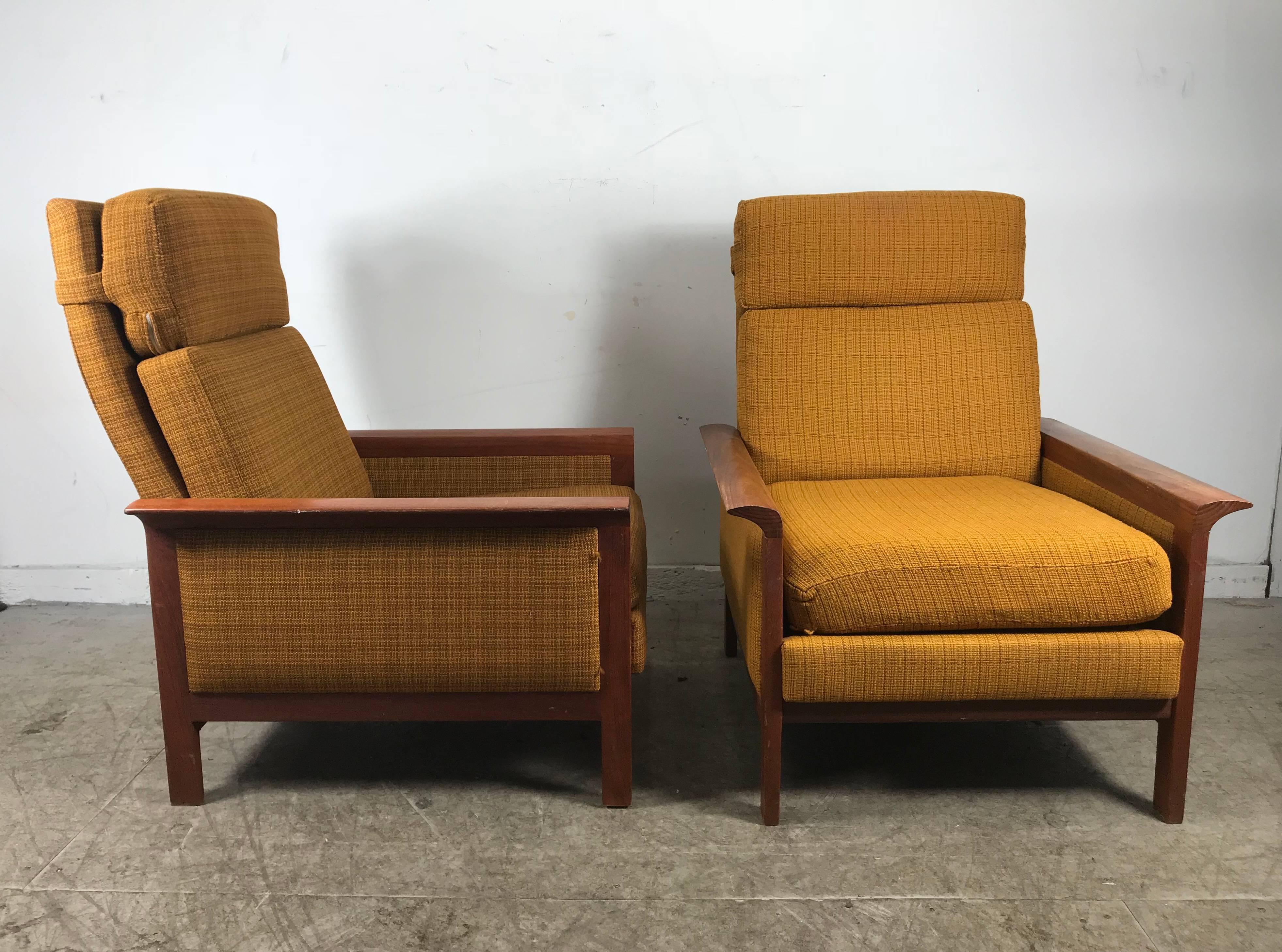 Classic Danish modern high back teak lounge chairs by Hans Olsen, superior quality and joinery solid Teak wood frame, retains original gold wool period upholstery. Extremely comfortable.