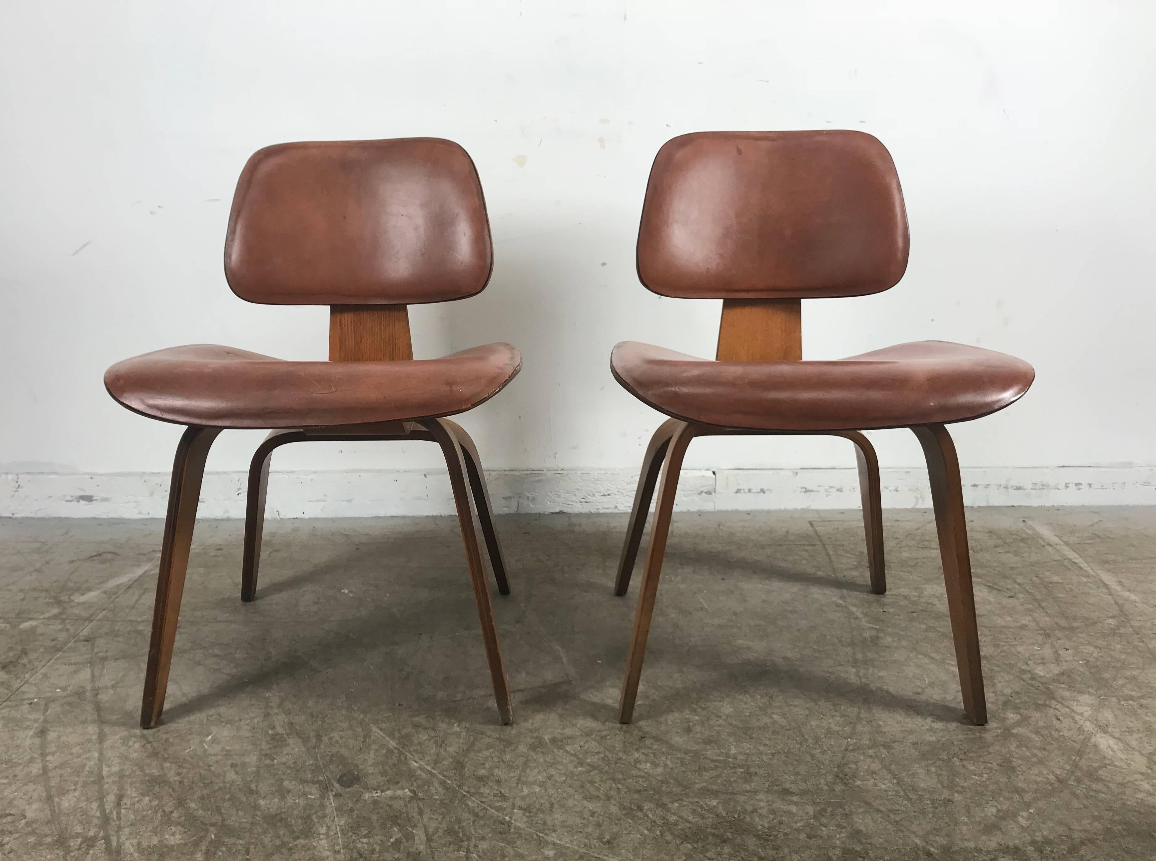 Mid-Century Modern Rare Early Production Pair of Leather and Walnut D C W's by Charles Eames
