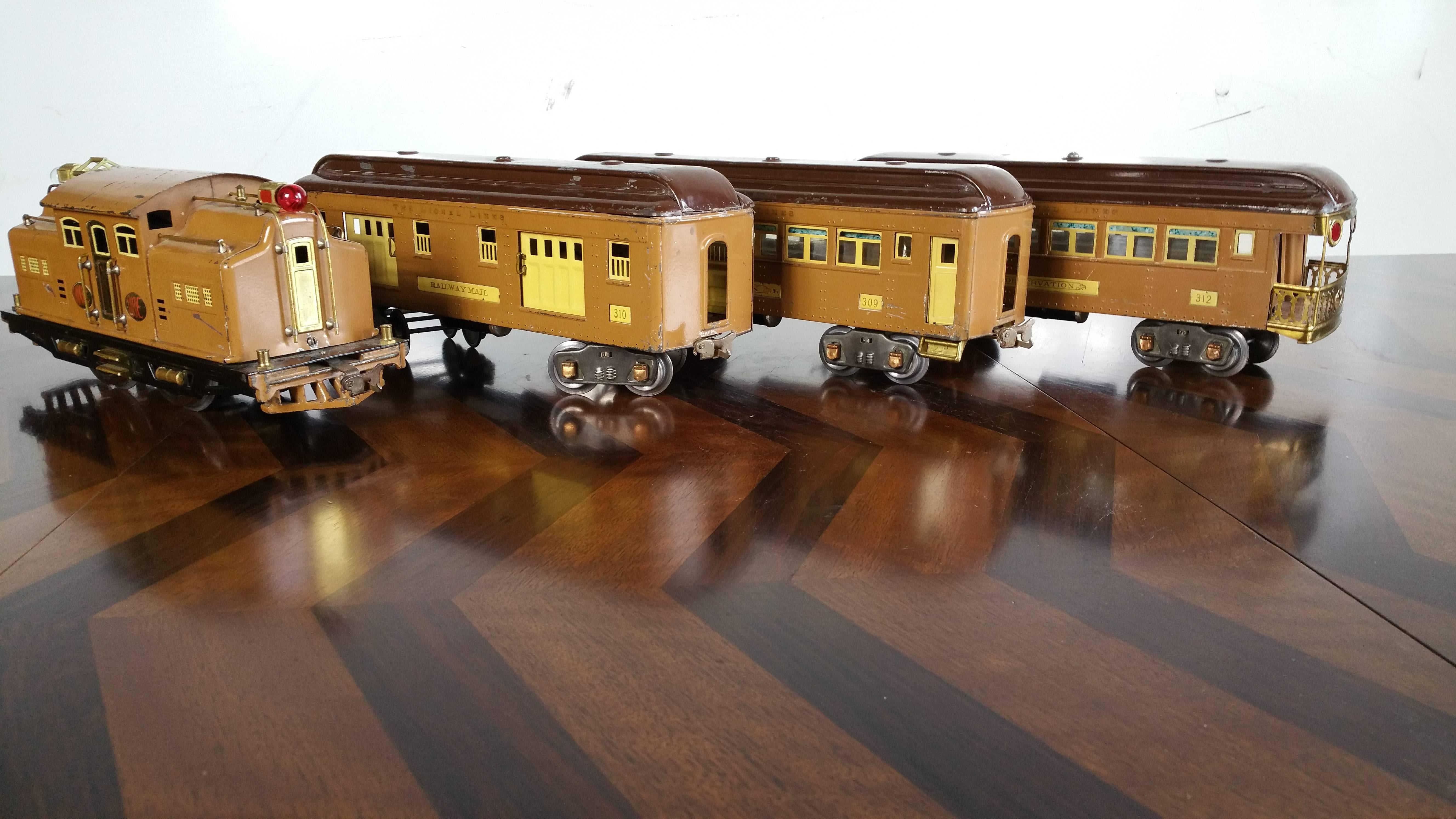 Four-Piece Train Set made by Lionel..Standard Gauge,, from the BILD-A-LOCO line.. Late 1920s..early 1930s.. Super Art Deco Design,,truely sculpture more then toy,Set contains engine car,railway mail,,pullman,,and observation car..All pressed steel