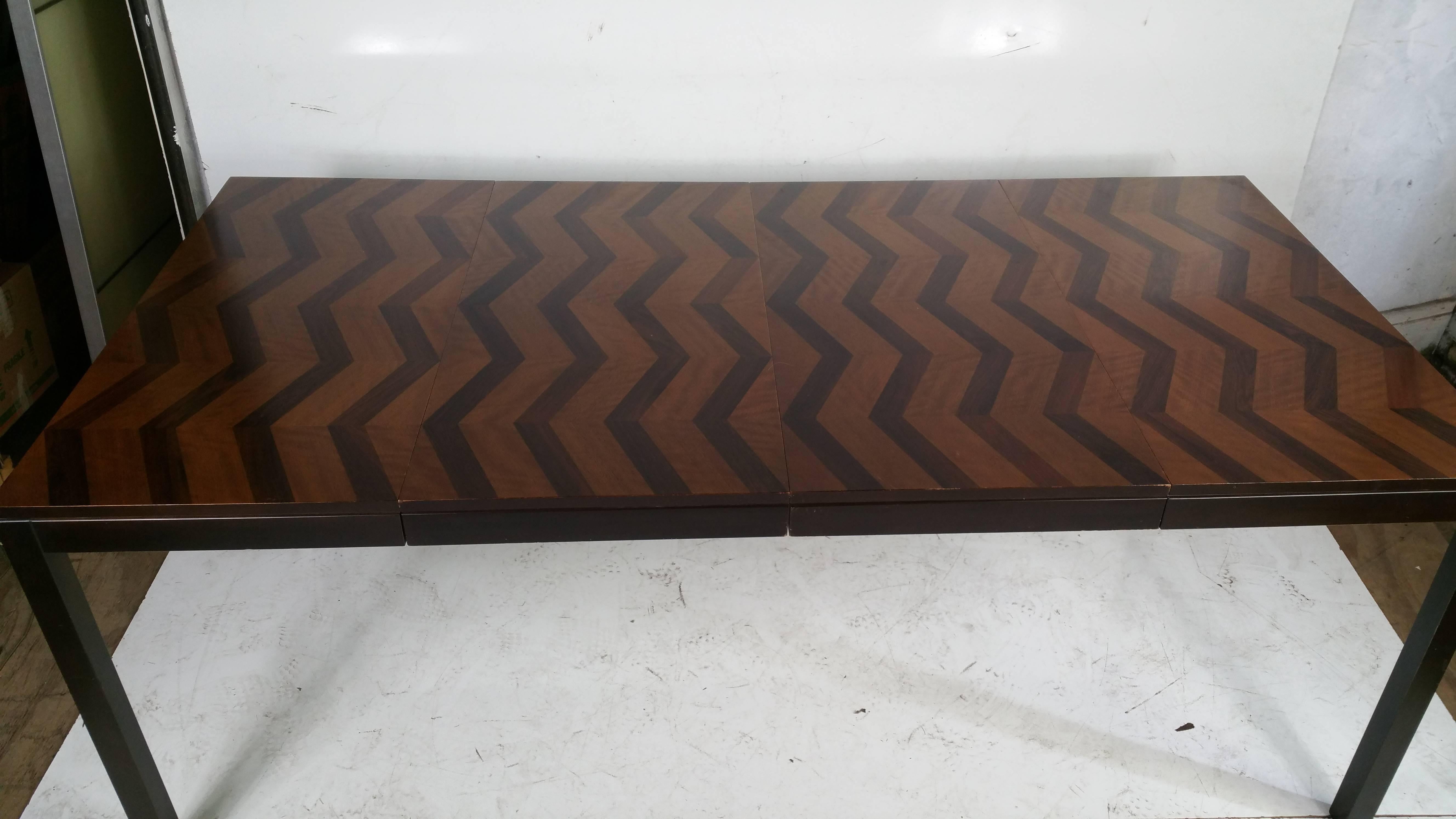 Beautiful expanding dining dining table designed by Milo Baughman for Direectional,, Exceptional herringbone designed rosewood and walnut top,Table measures 38