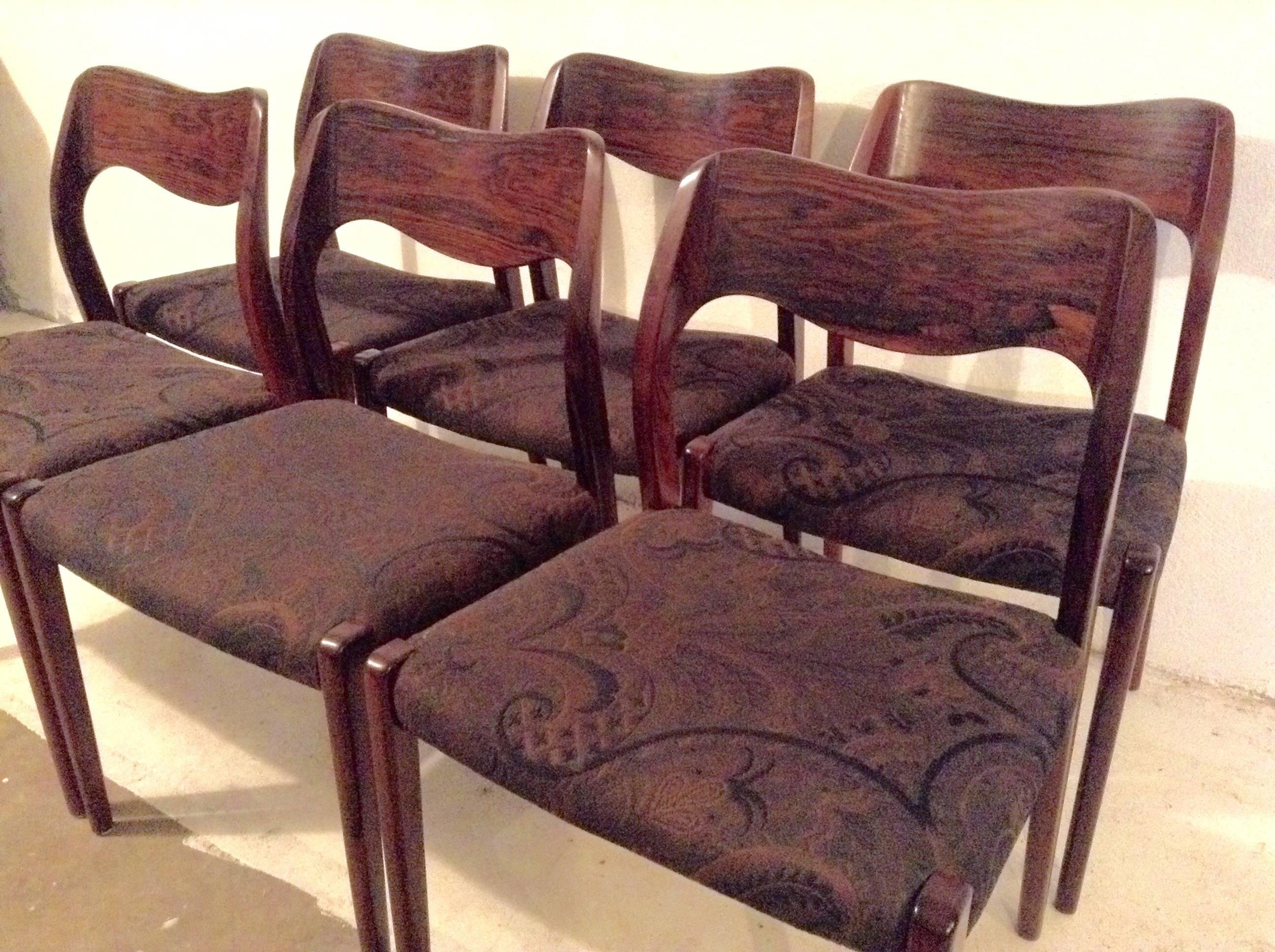 Stunning set of six matching dining chairs designed by Niels Otto Møller, Model # 71, amazing figured Brazilian rosewood, Classic Danish Modern style, Fresh and contemporary today as when they were designed in the 1950s.