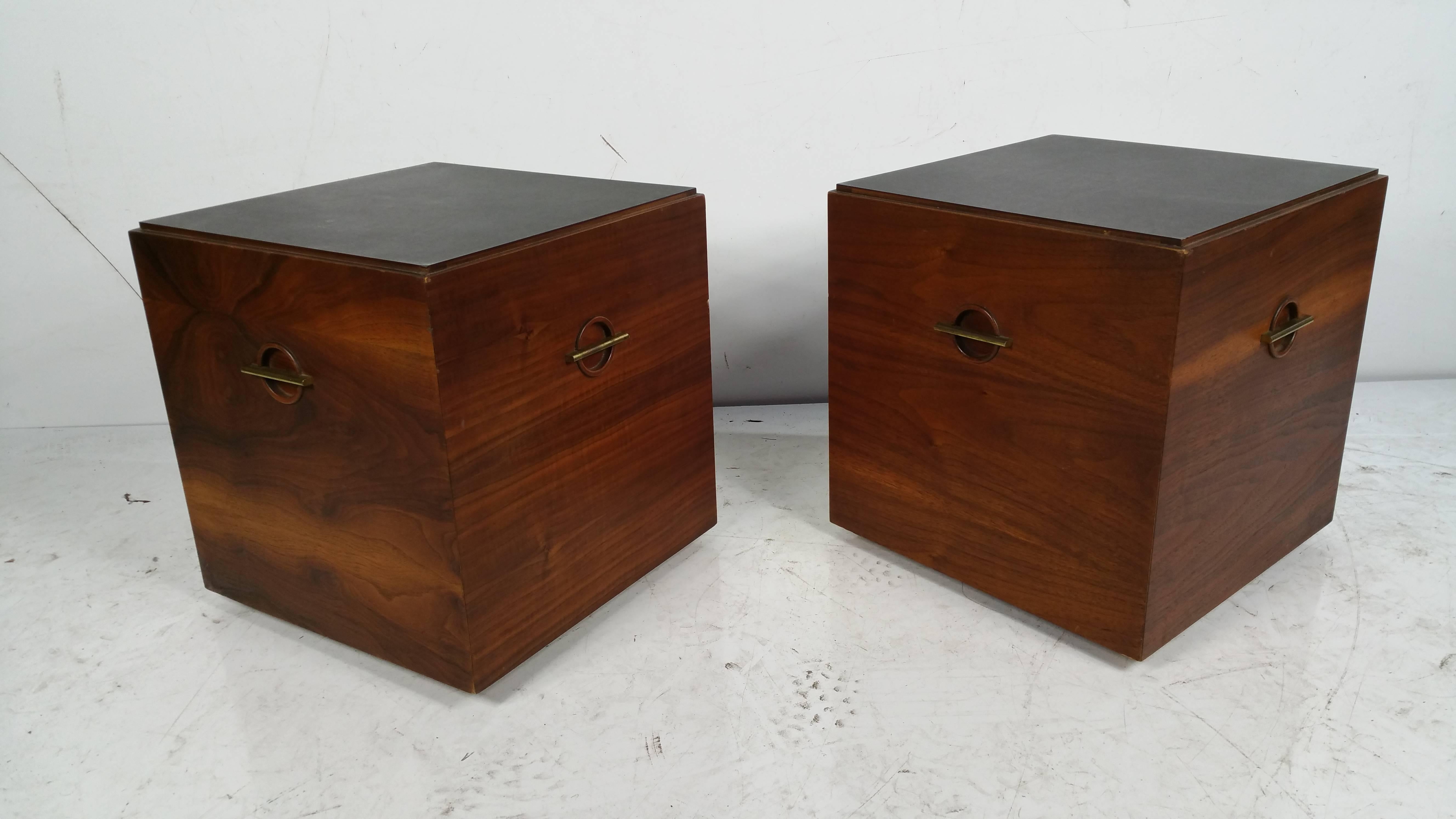 Unusual pair of stands manufactured by Lane,, Figured walnut wood,,handsome brass detailing to all four sides,, Faux slate tops,,on castors.