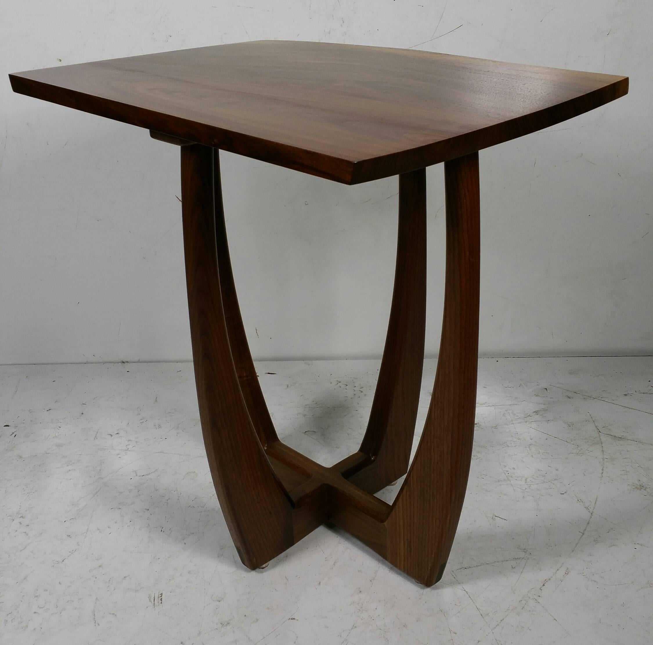 Figured walnut modernist table, Griff Logan exhibits :
2013 Arts Council For Wyoming County, Perry, NY, “Local Color”
2007–present Ashwood Artisans, East Aurora, NY

Education:
1987-1988 Graphic Careers Design School, Rochester, NY,