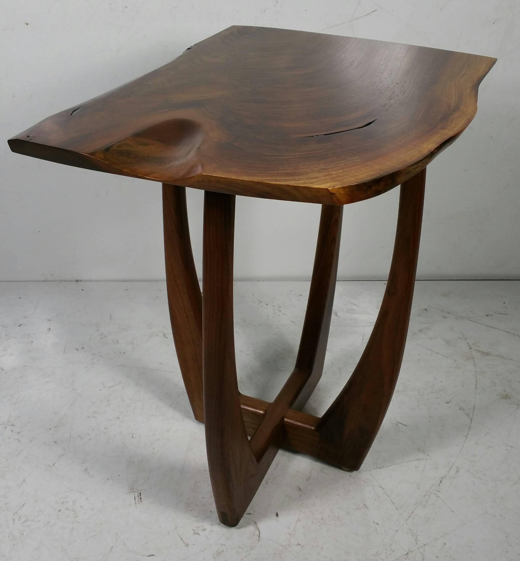Figured walnut modernist table Griff Logan exhibits :
2013 Arts Council For Wyoming County, Perry, NY, “Local Color”
2007–present Ashwood Artisans, East Aurora, NY

Education:
1987-88 Graphic Careers Design School, Rochester, NY, Illustration,