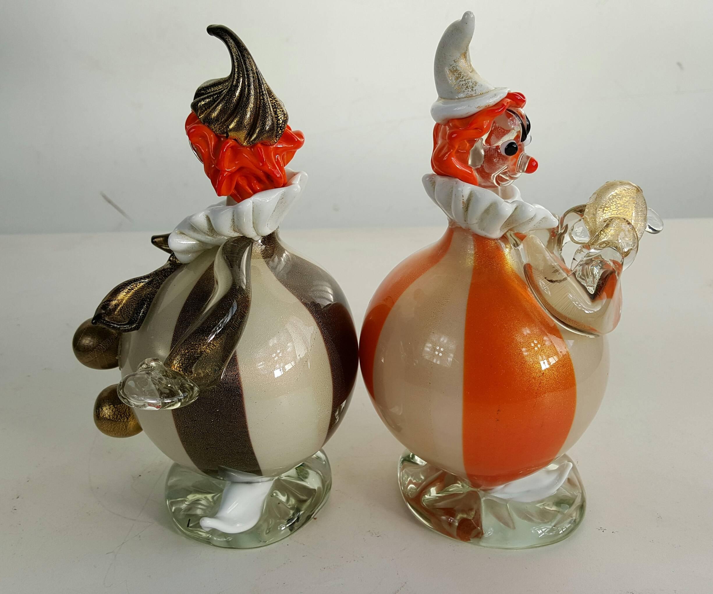 Fabulous Pair of whimsical hand blown venetian glass clowns made by Alfredo Barbini..Retain original label,,