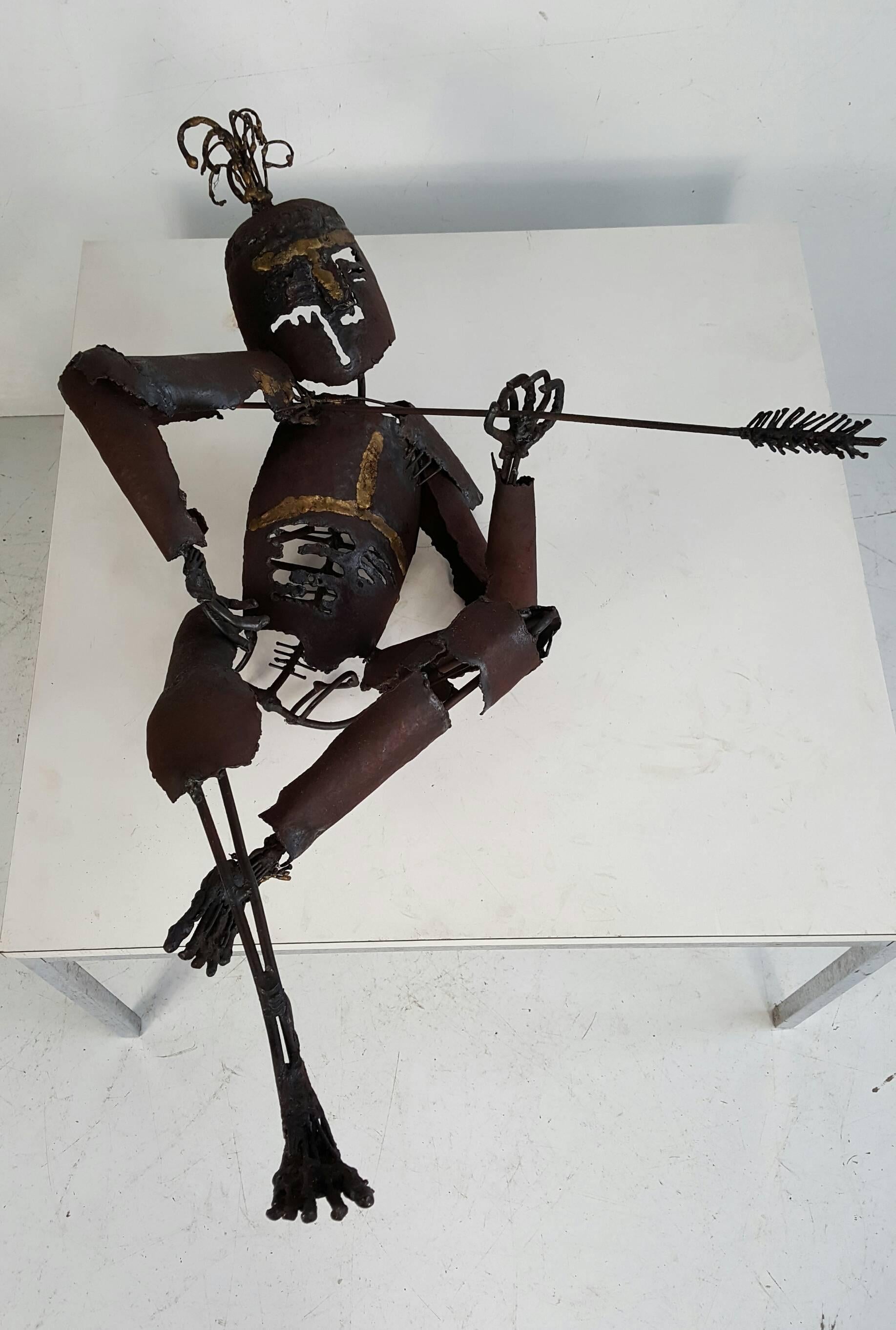 Wonderful Hand made,welded brutalist sculpture depicting man removing arrow,, Artist unknown but very well exicuted,,detailed hands ,,feet and rib-cage,, Done in the manner of Fantoni