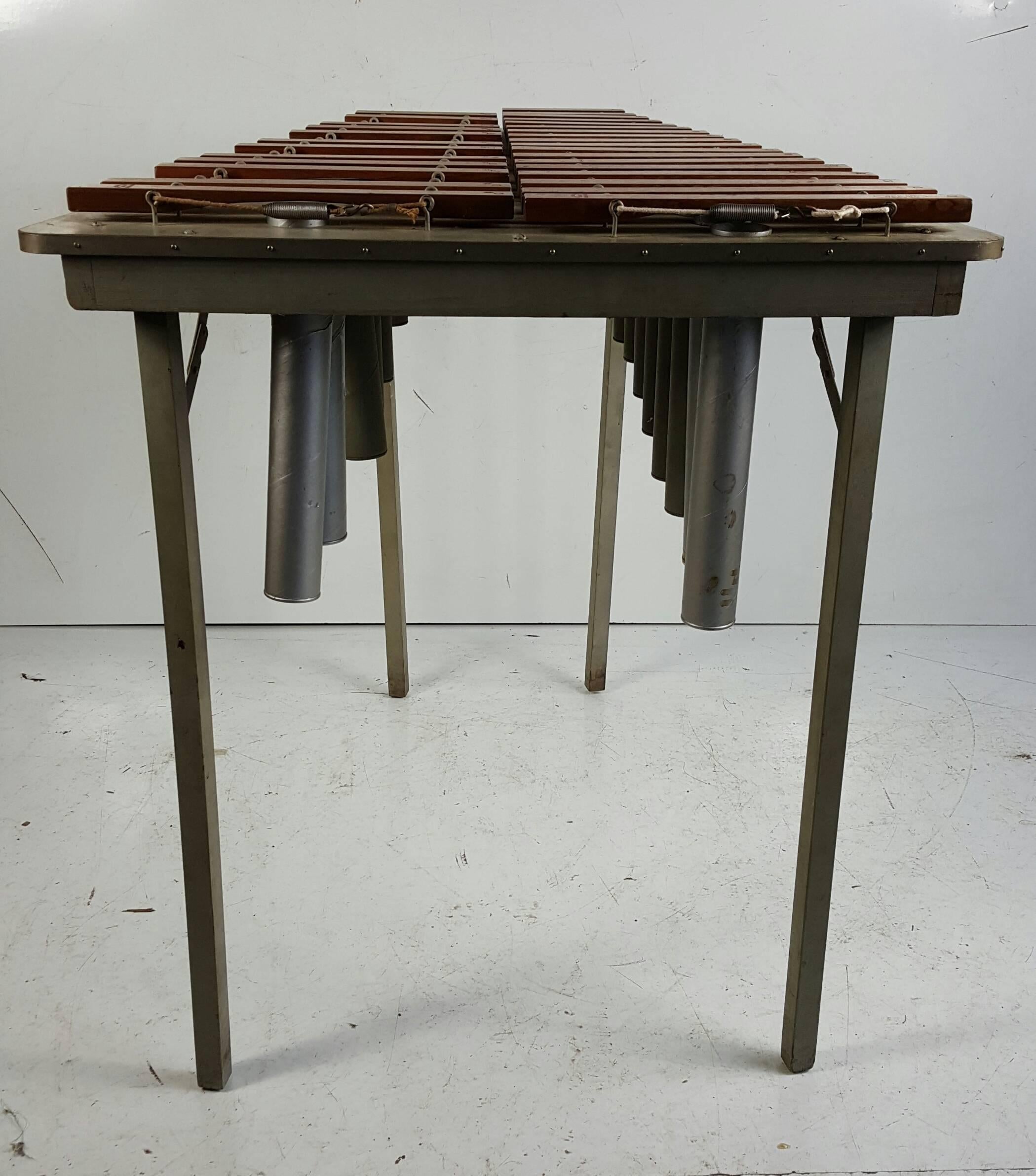 1940s Portable Deagan Marimba,, Rosewood bars,Beautiful warm rich sound /tone.

The Marimba originated in Africa and consisted of bars of resilient wood mounted over gourds and were used by the natives of Africa as war drums. The African Marimba