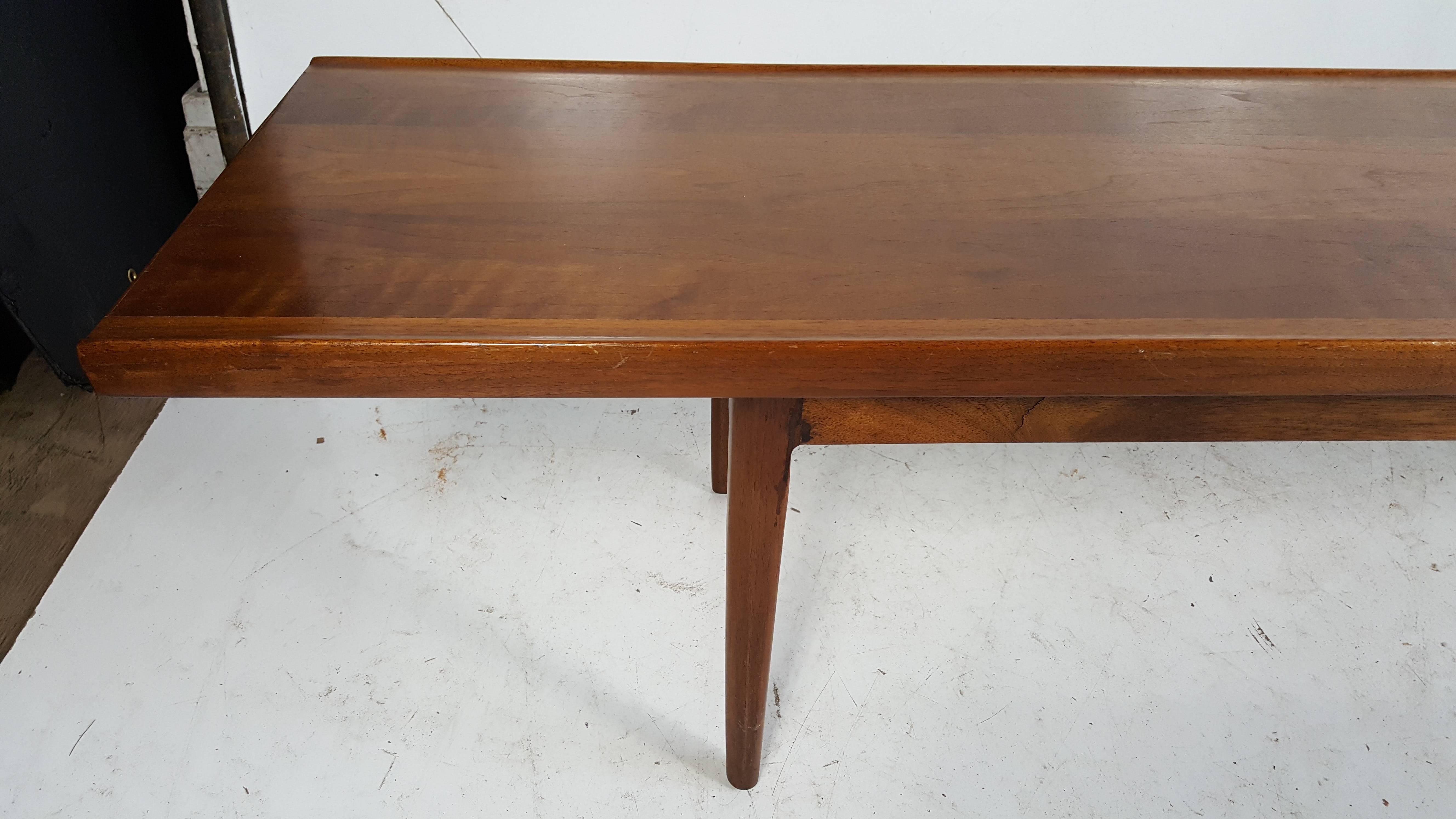 Classic modernist bench table designed by Stewart McDougall & Kipp Stewart, manufactured by Drexel “Declaration,” solid walnut construction.