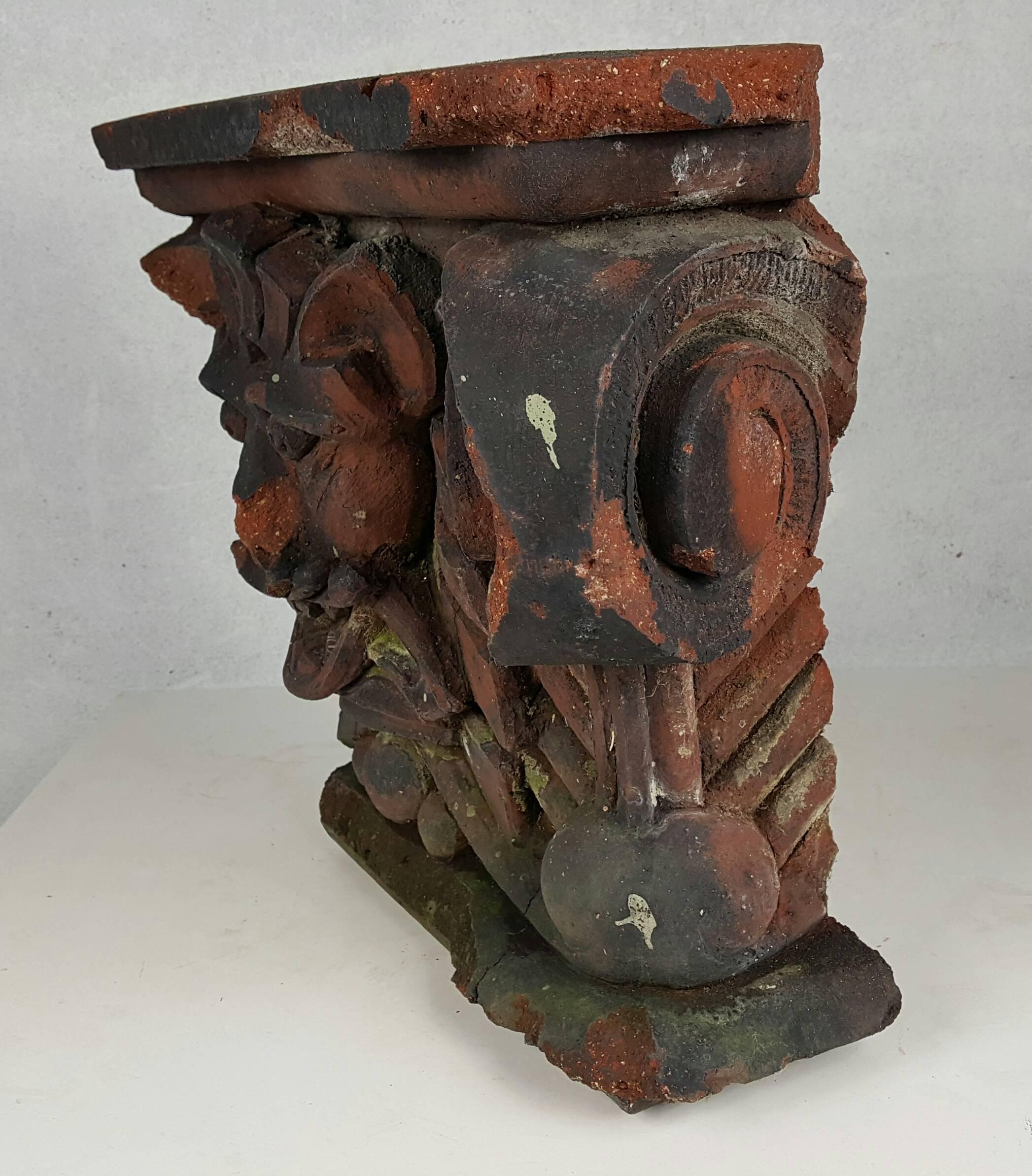 Mid-19th century architectural corbel/element fragment depicting demon spirt or gargoyle, amazing color, finish, patina, possibly element off a building, capital or corbel.