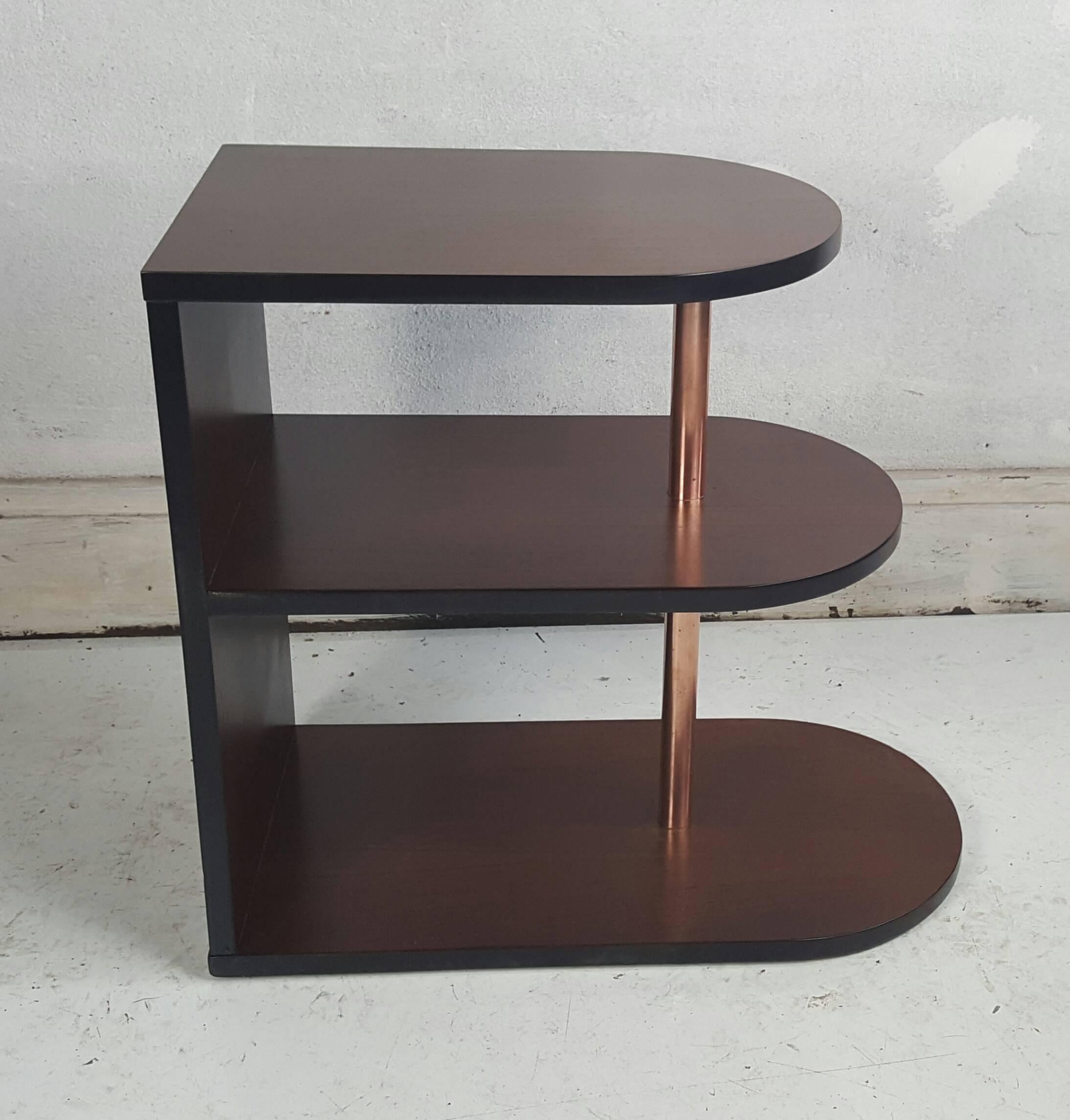 Three-tiered Art Deco streamline step table, Classic, sleek. Simple design. Reminiscent of the iconic designs of the masters such as Donald Deskey, Gilbert Rohde, Kem Weber etc. Beautiful warm walnut wood finish trimmed in black lacquer,