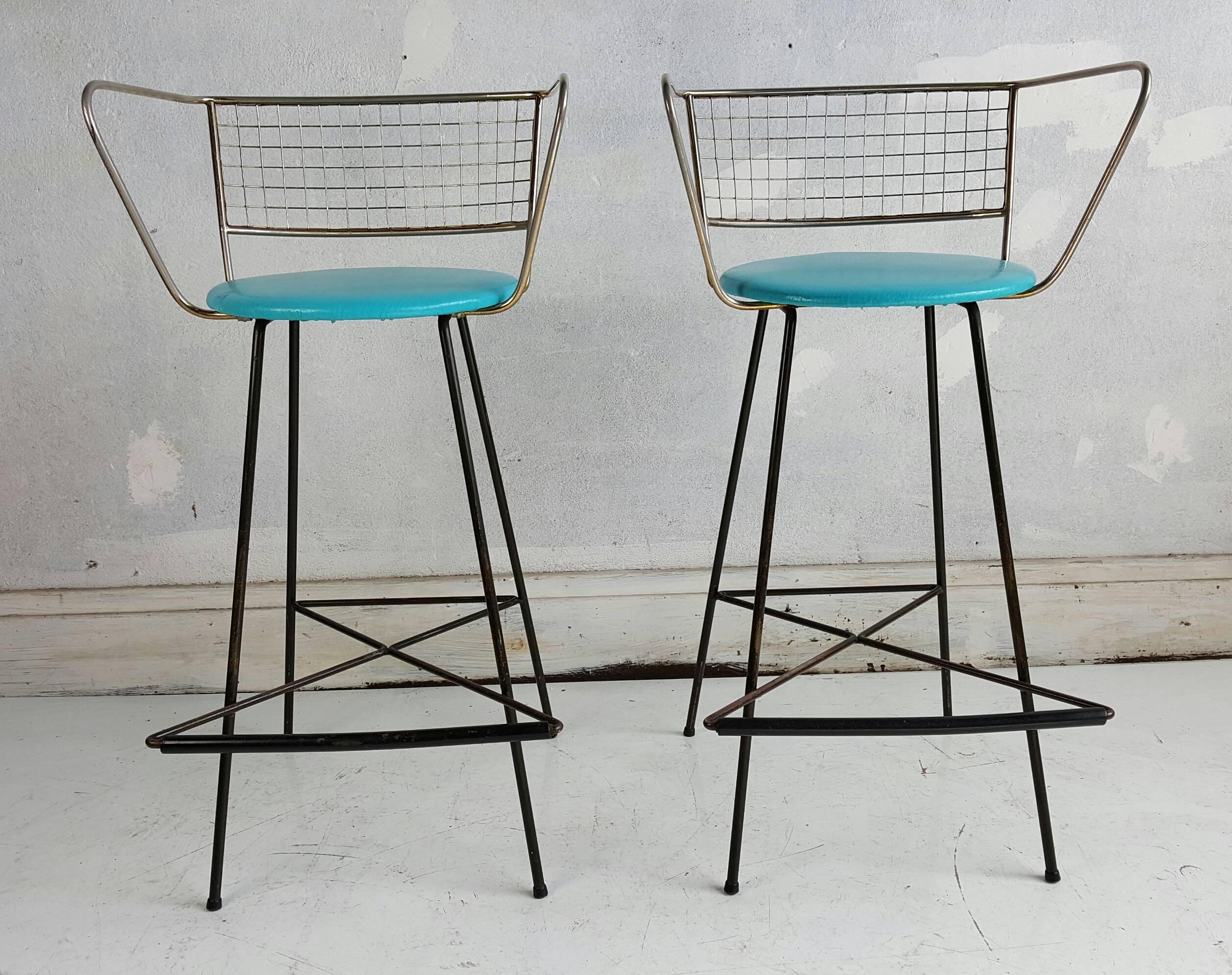 Amazing pair of Mid-Century Modern bar or counter stools. Right out of the Jetsons, Classic sculptural brass Bertoia like design seats. As well as giometric iron base design with elements of Frederick Weinberg, Tony Paul, etc. Stunning fun.
