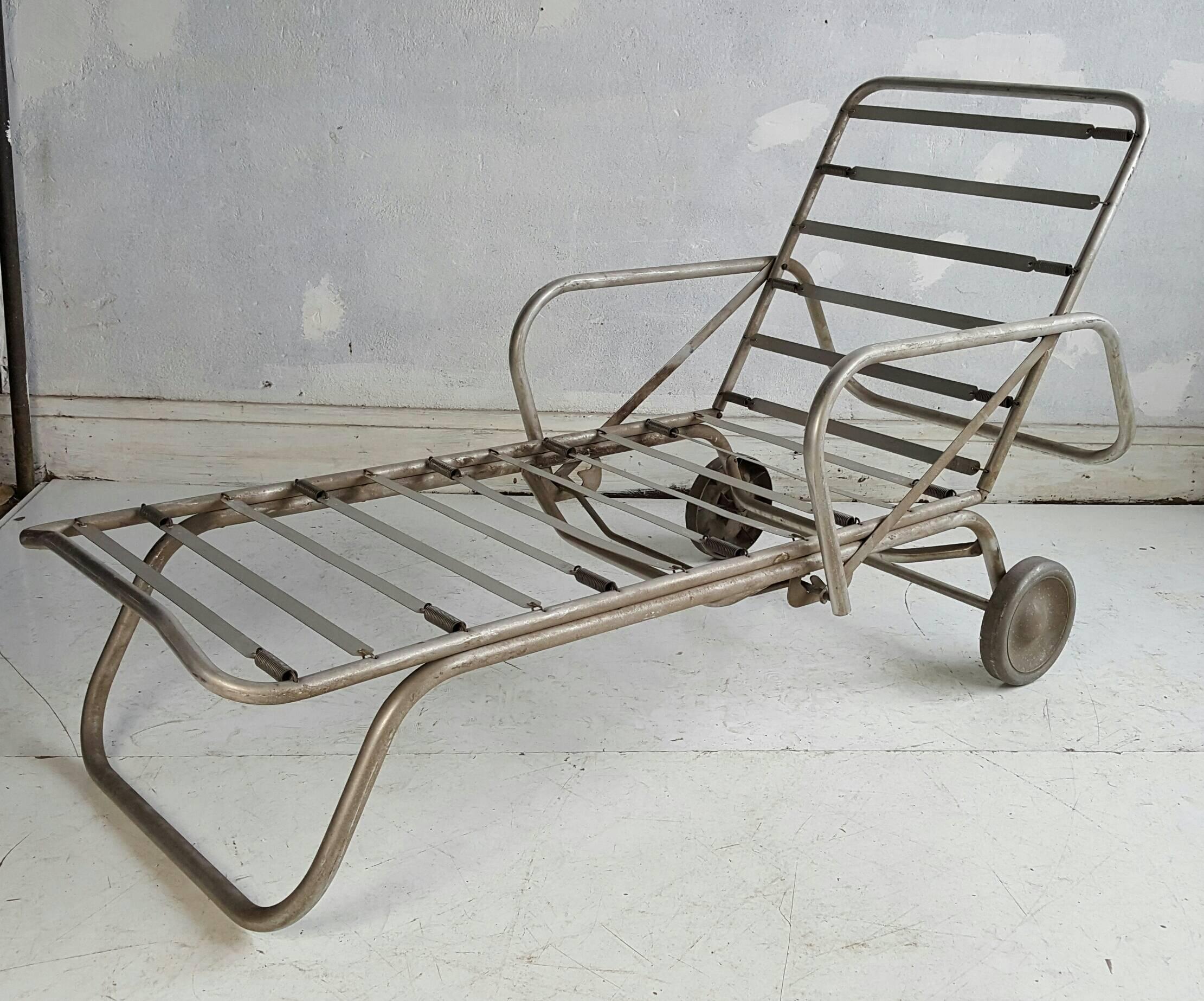 Classic Aluminum outdoor living,, Pair of matching chaise lounges manufactured by Deeco,Craftsman in Aluminum ,California,Wonderful Art Deco ,Machine Age style.  Reminiscent of the classic sought after aluminum pieces designed by Warren