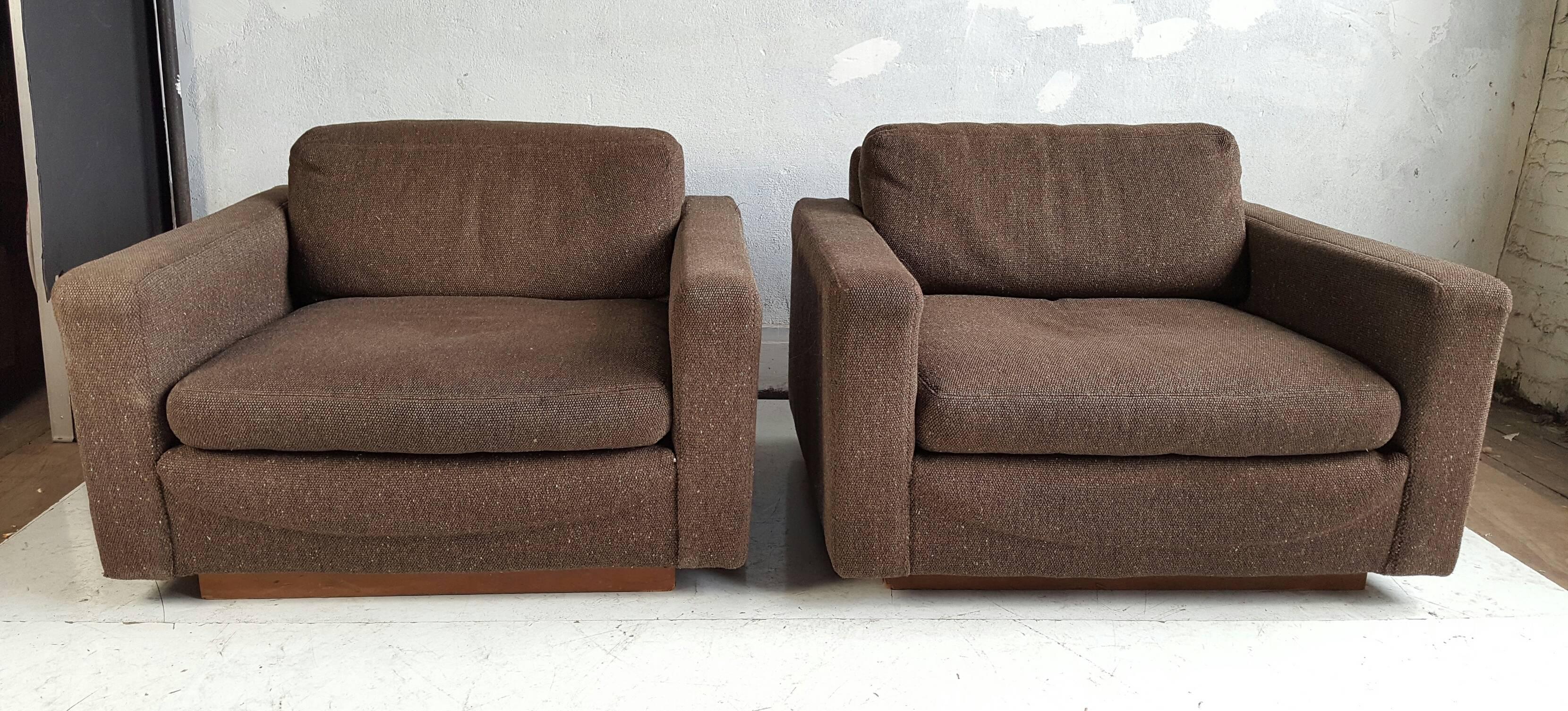 Classic pair of Mid-Century Modernist cube chairs designed by Milo Baughman for Thayer Coggin. Retain original brown wool fabric,. Walnut veneer bases. Extremely comfortable chairs...Usable, but would be fabulous restored.