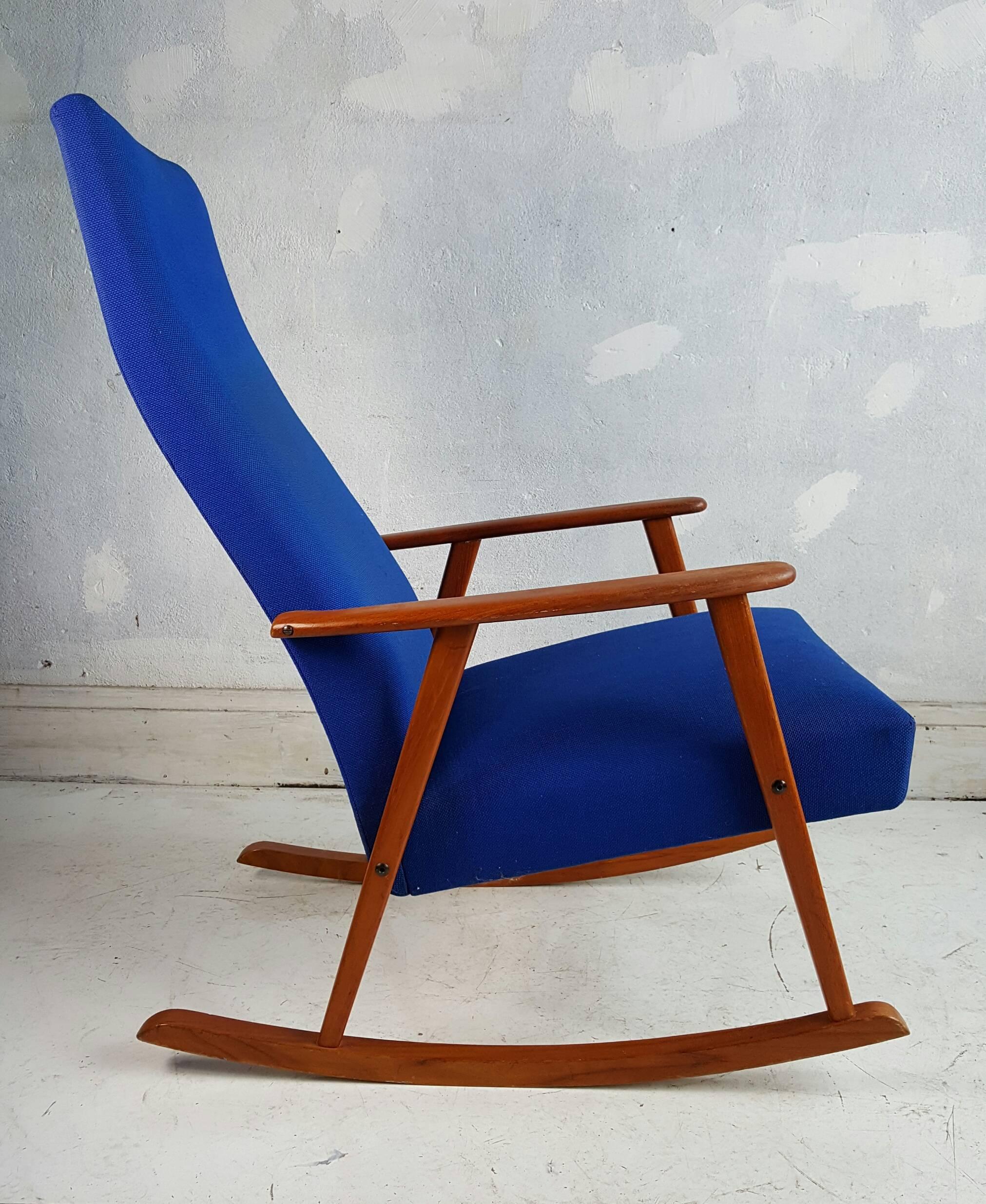 Mid-Century Modern Danish Rocking Chair. Teak wood construction, retains original electric blue wool fabric. Extremely comfortable, Classic styling.